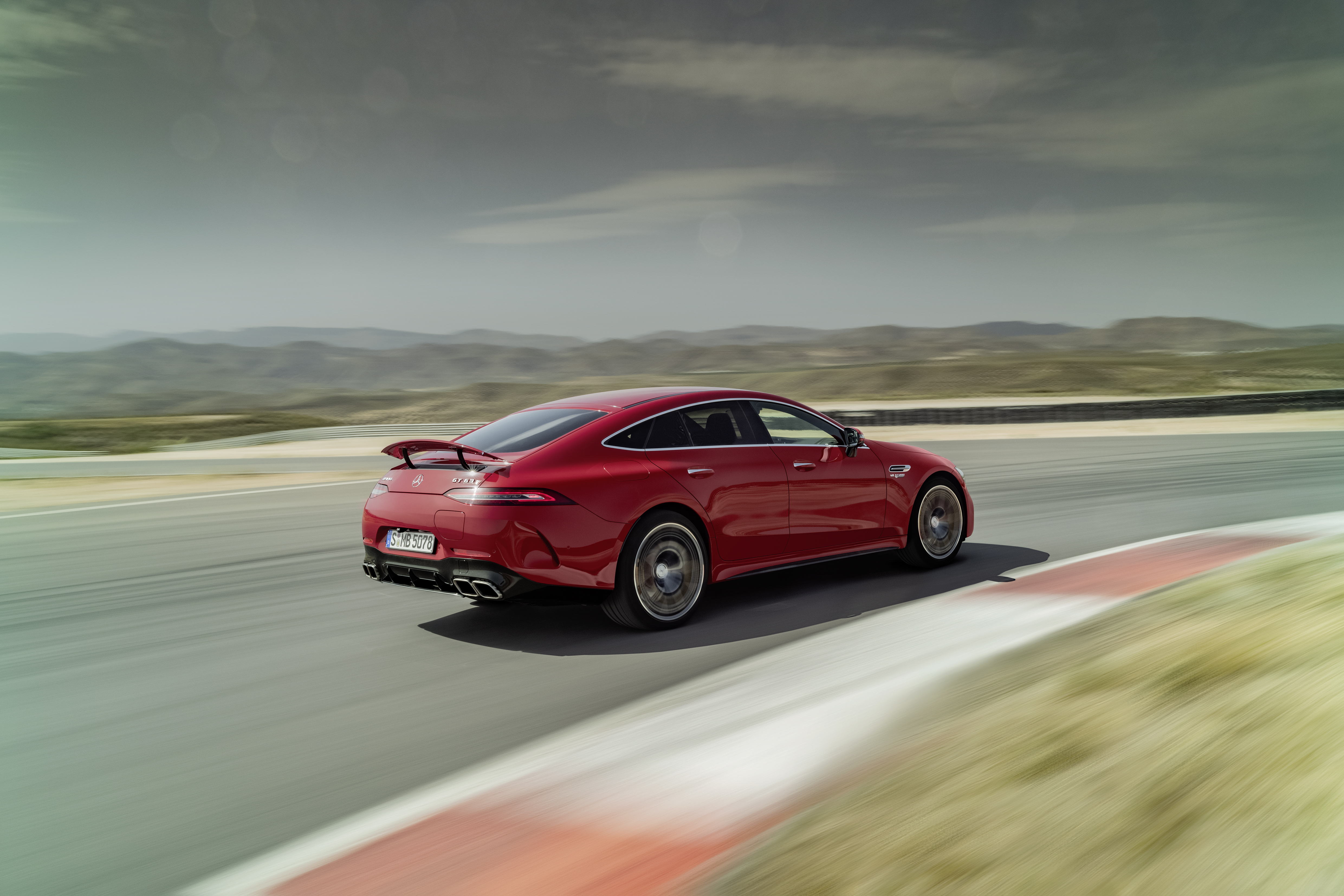 Red Mercedes-AMG GT 63 S E Performance on track HD Wallpaper