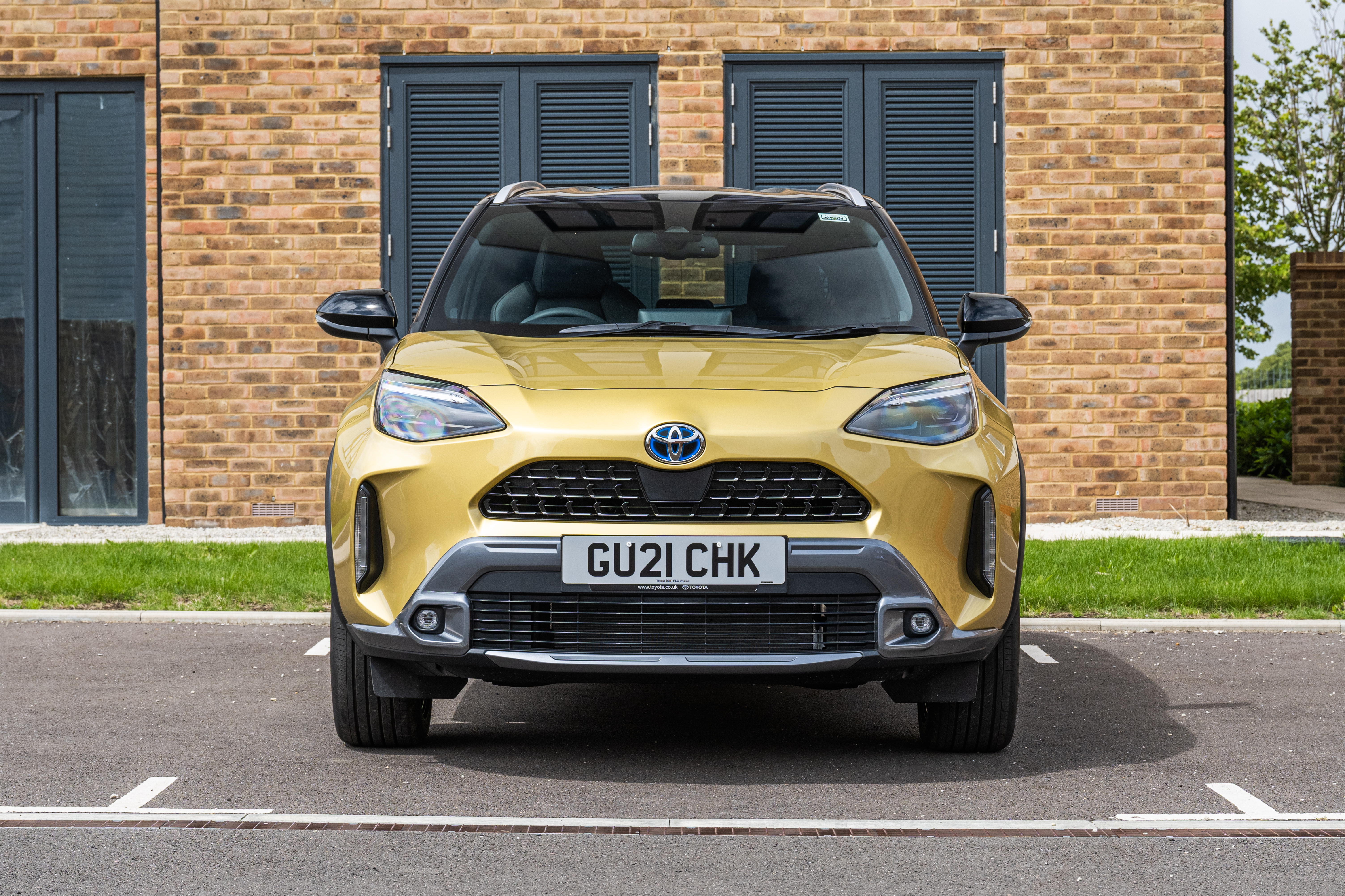 Yellow Toyota Yaris Cross Hybrid SUV front view HD Wallpaper