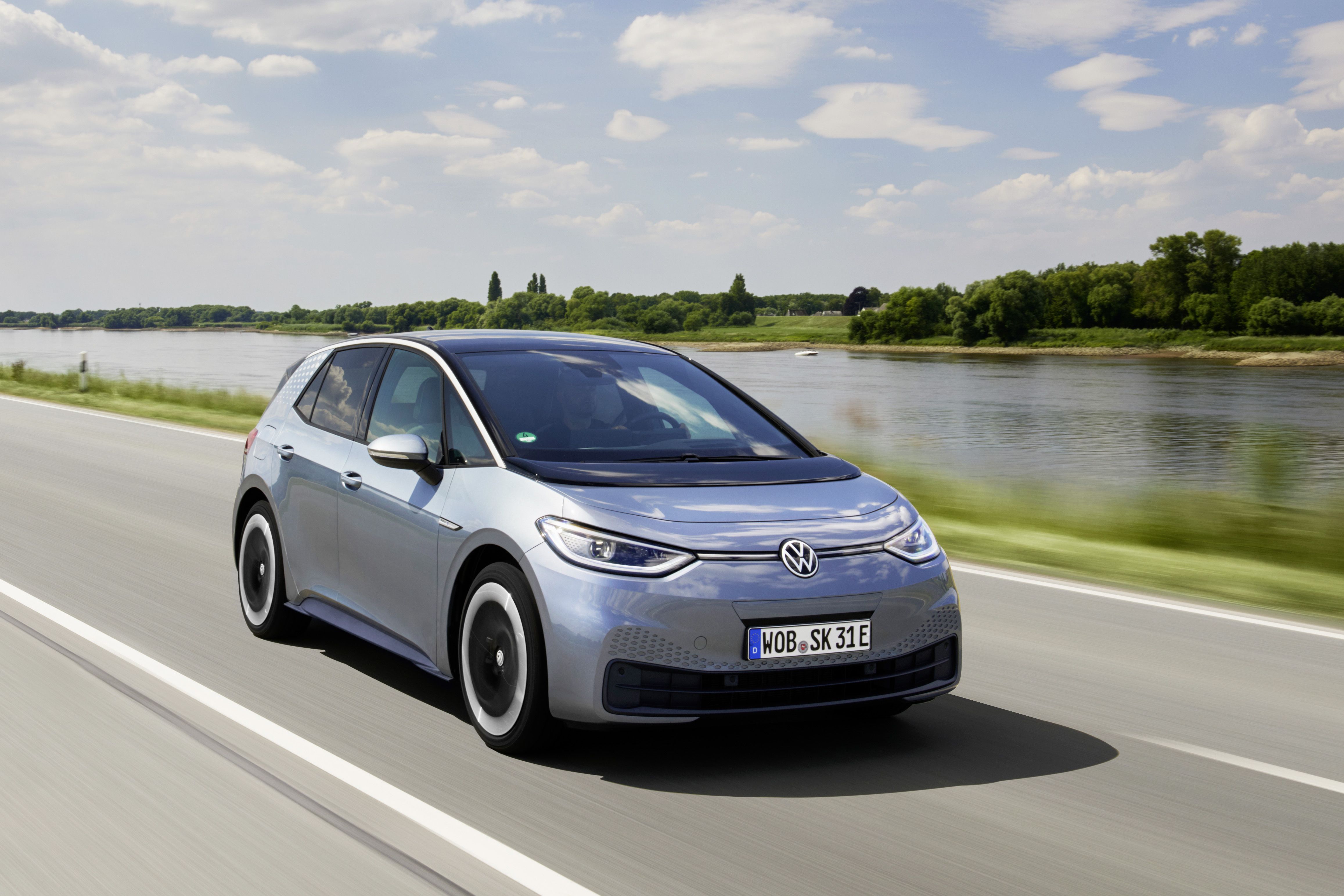 Volkswagen ID.3 Pro S electric car driving by a river HD Wallpaper