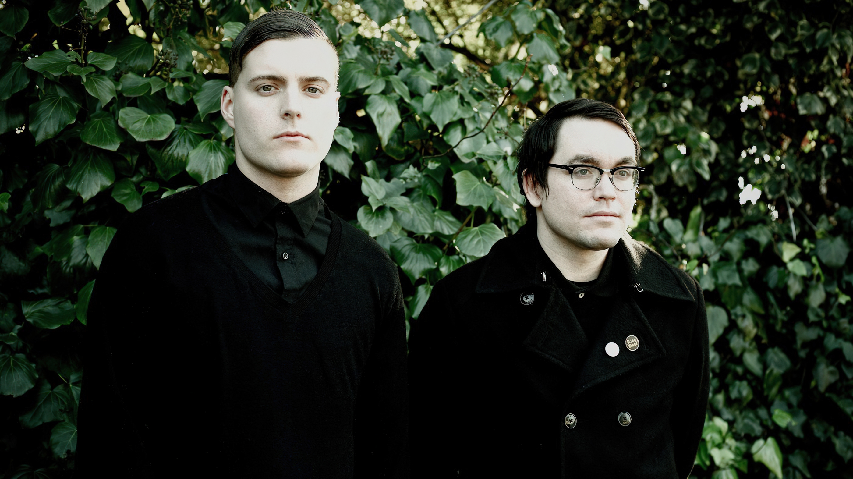 Deafheaven band members portrait against green foliage HD Wallpaper