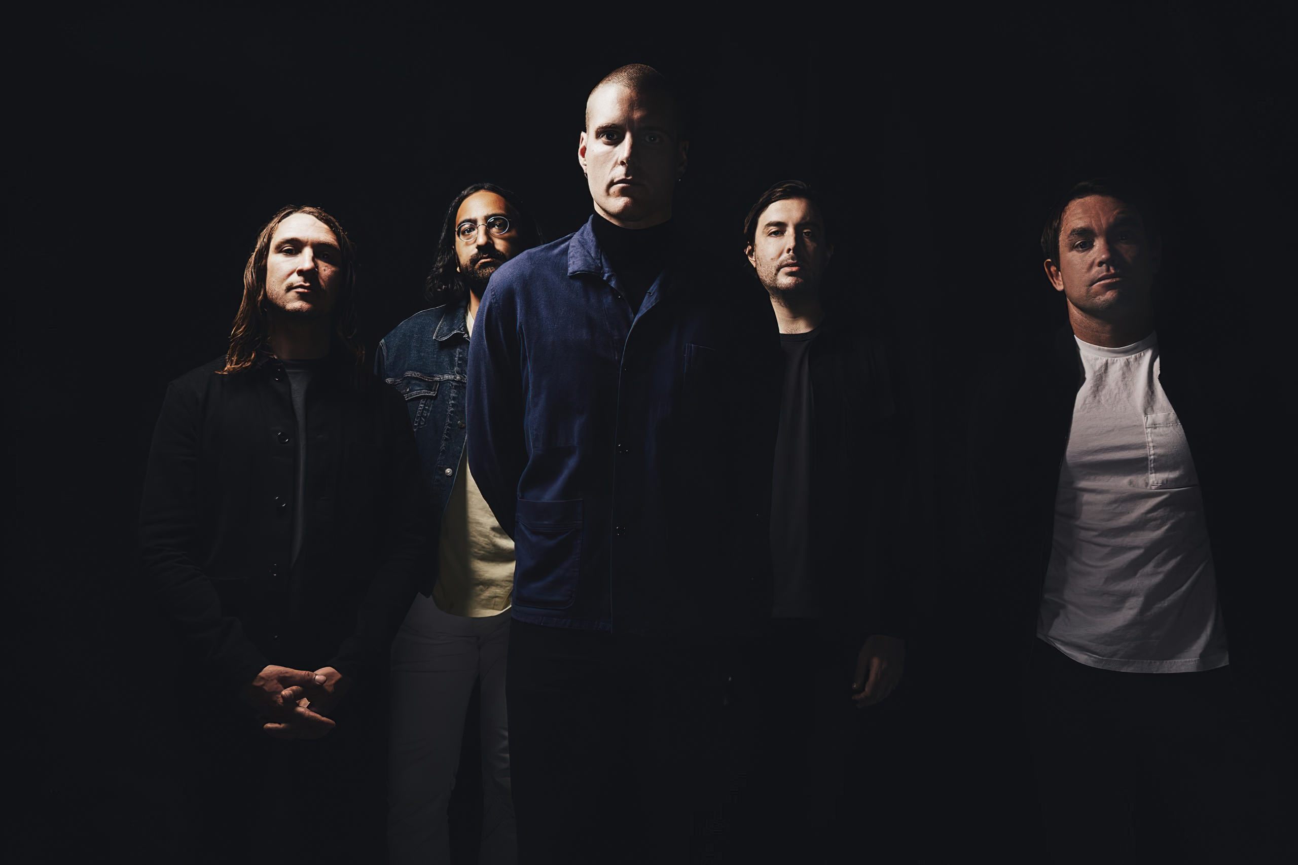 Deafheaven band members in a dark moody portrait HD Wallpaper