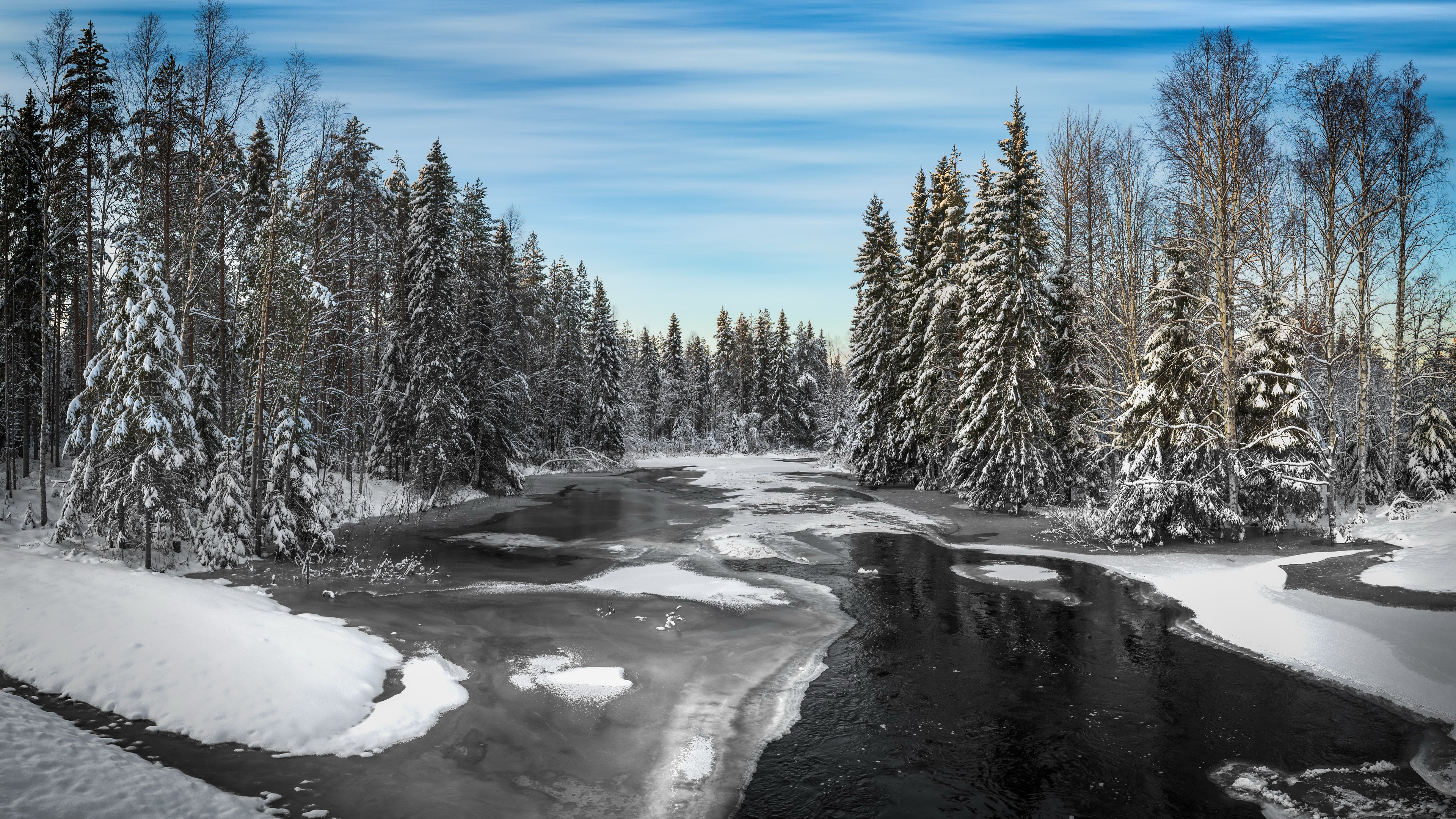 Snowy winter forest and partially frozen river HD Wallpaper
