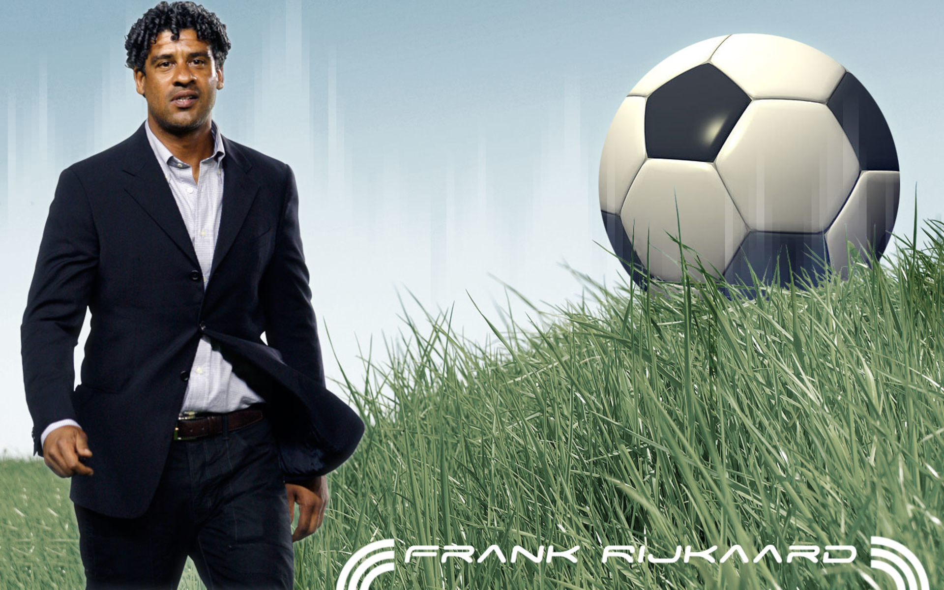 Dutch soccer legend Frank Rijkaard in a grassy field HD Wallpaper