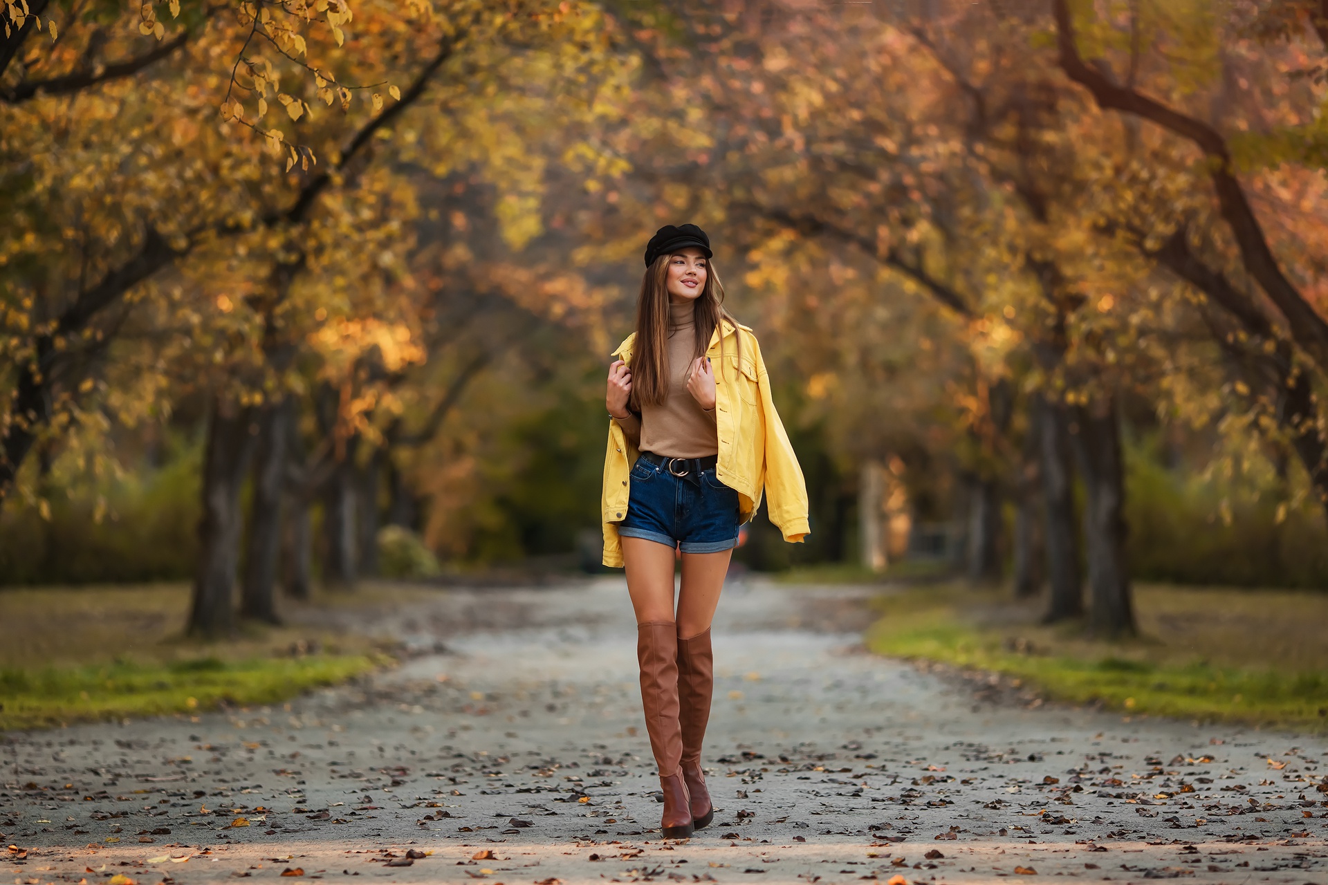Autumn model in boots with blurred background HD Wallpaper