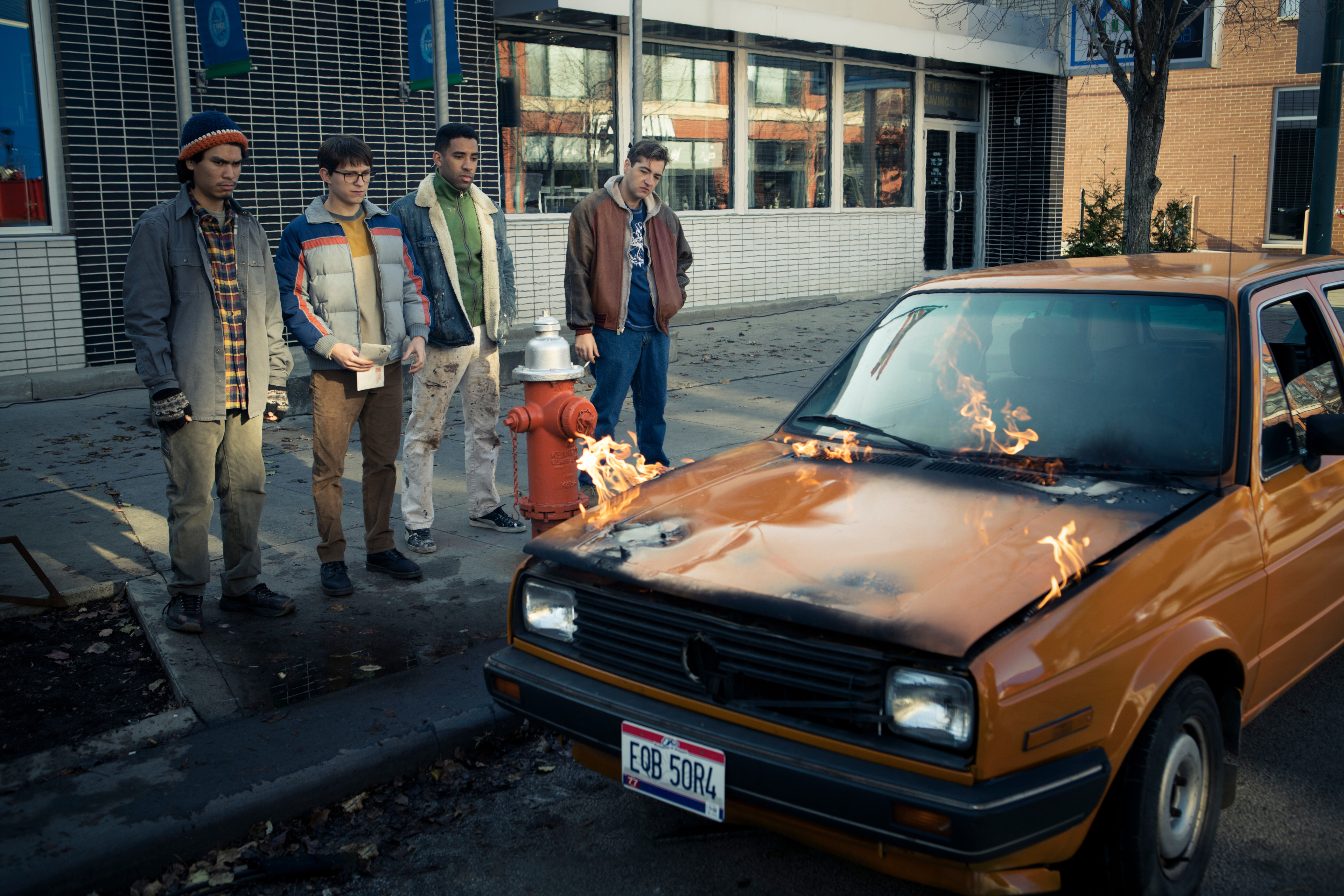 Cherry: Tom Holland and cast look at burning car HD Wallpaper