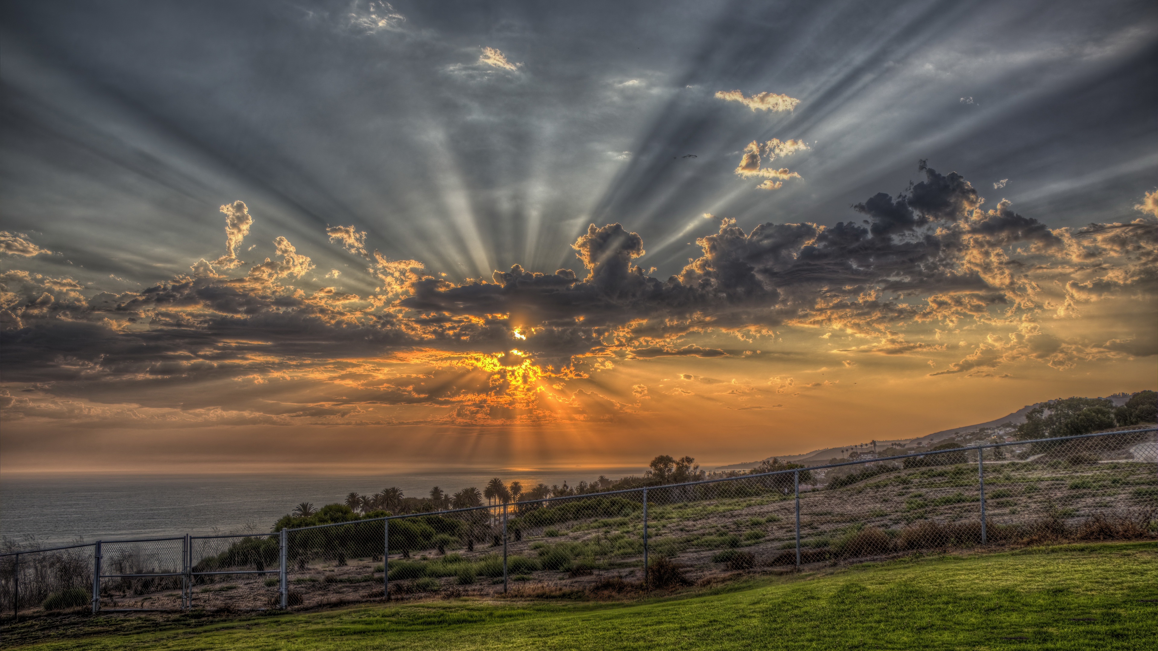 Dramatic Crepuscular Rays Over Ocean Landscape at Sunset HD Wallpaper