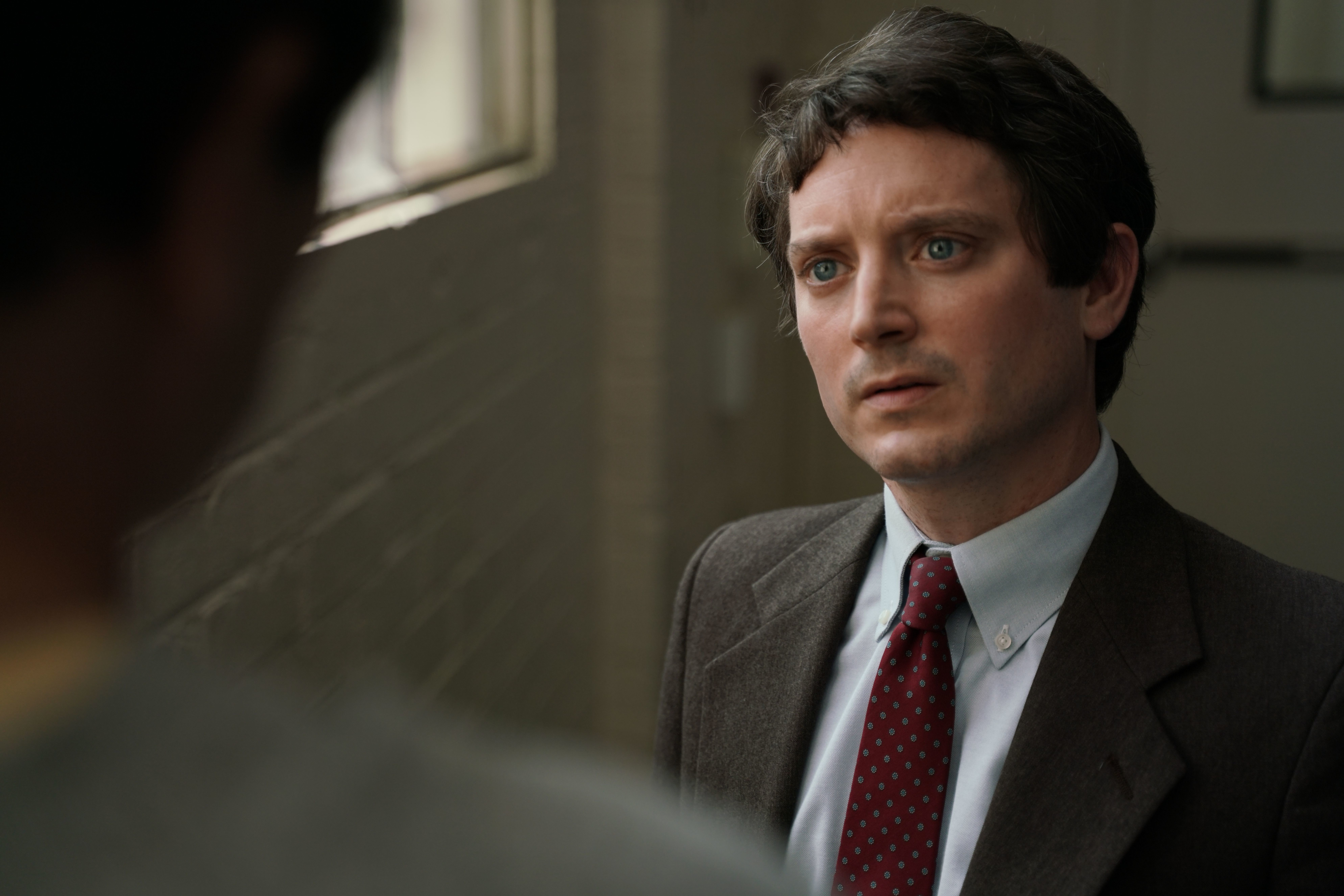 Elijah Wood in No Man Of God, looking intently HD Wallpaper
