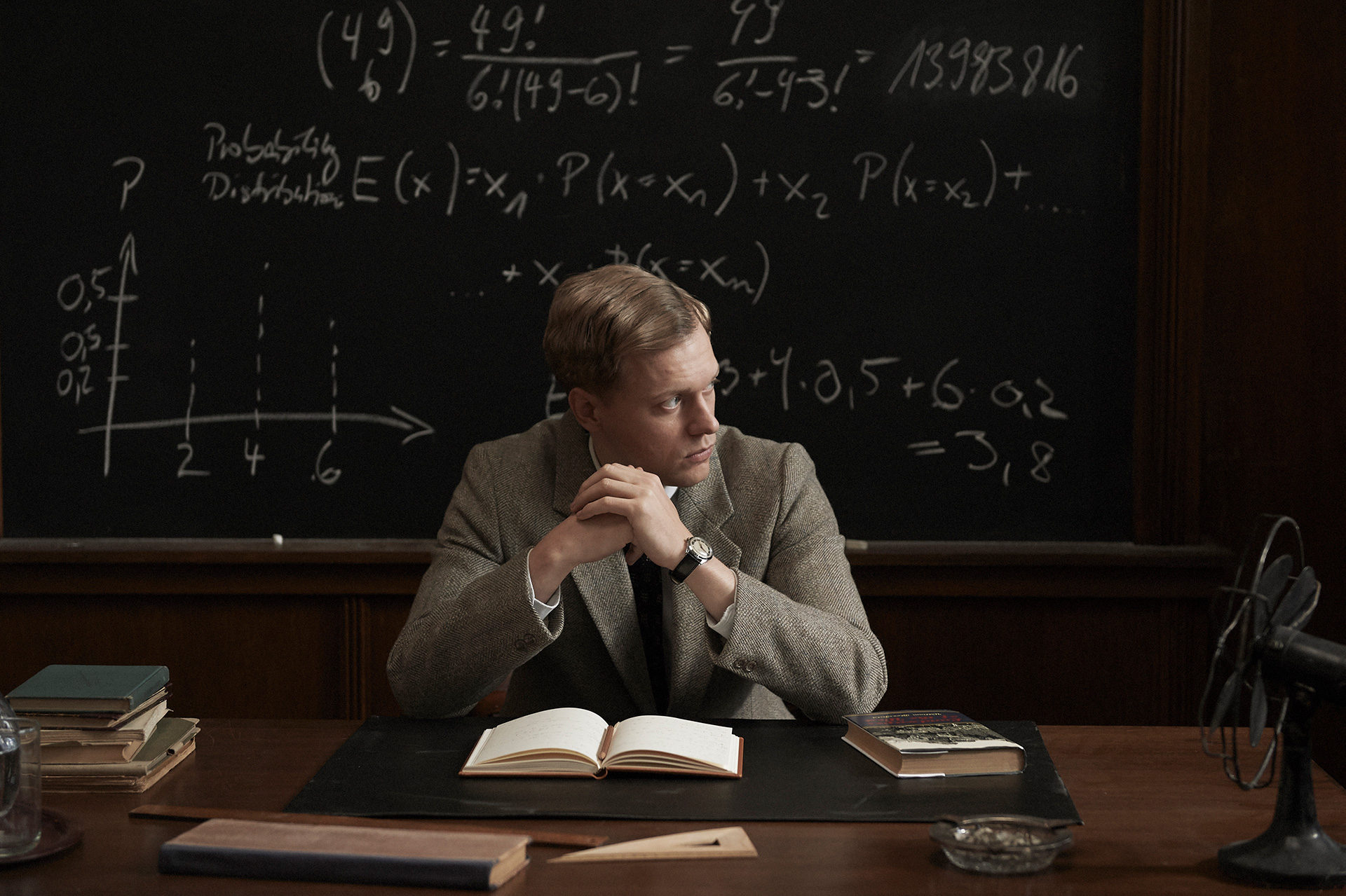Adventures Of A Mathematician: Philippe Tlokinski at desk HD Wallpaper