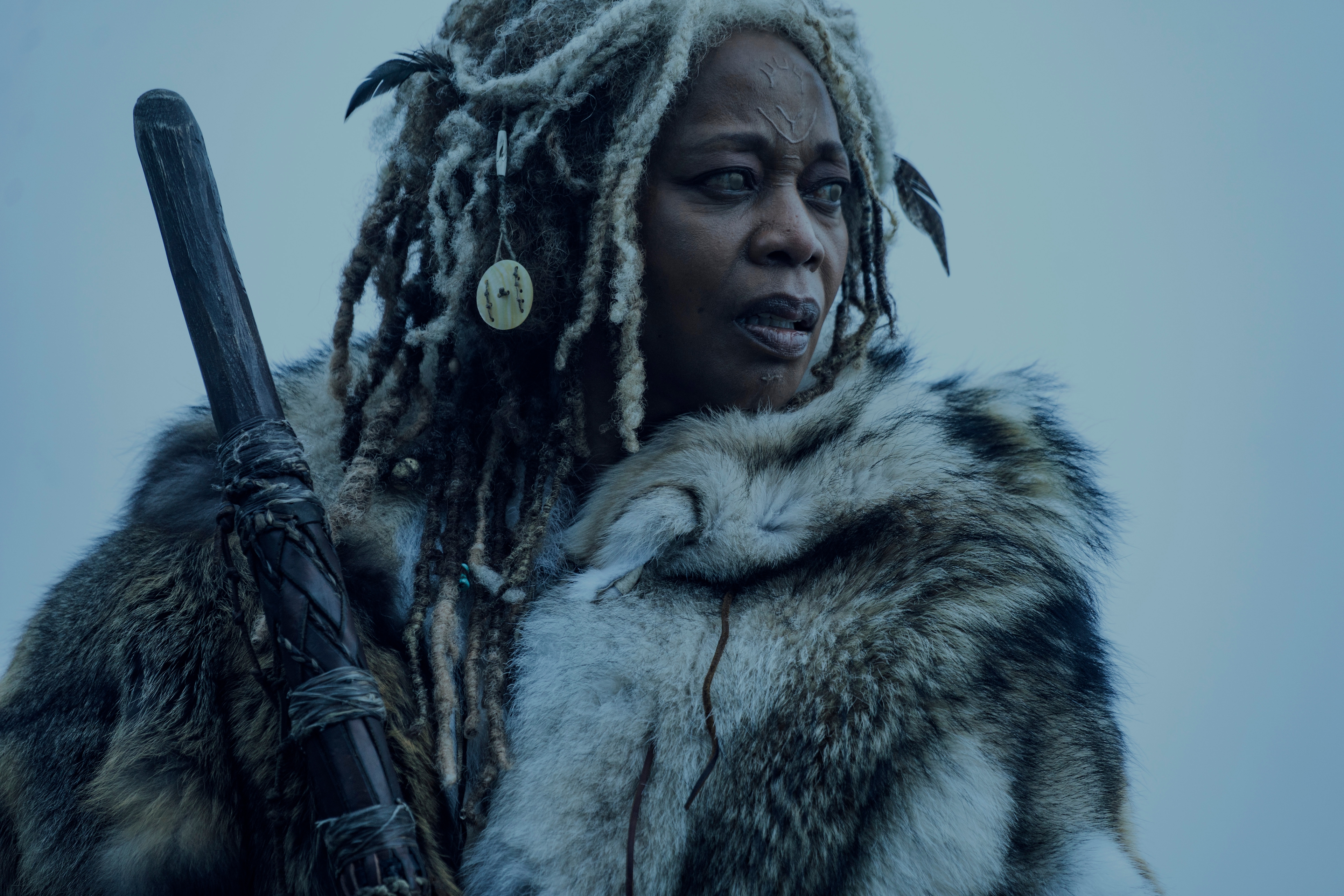 Alfre Woodard in furs with dreadlocks and staff HD Wallpaper