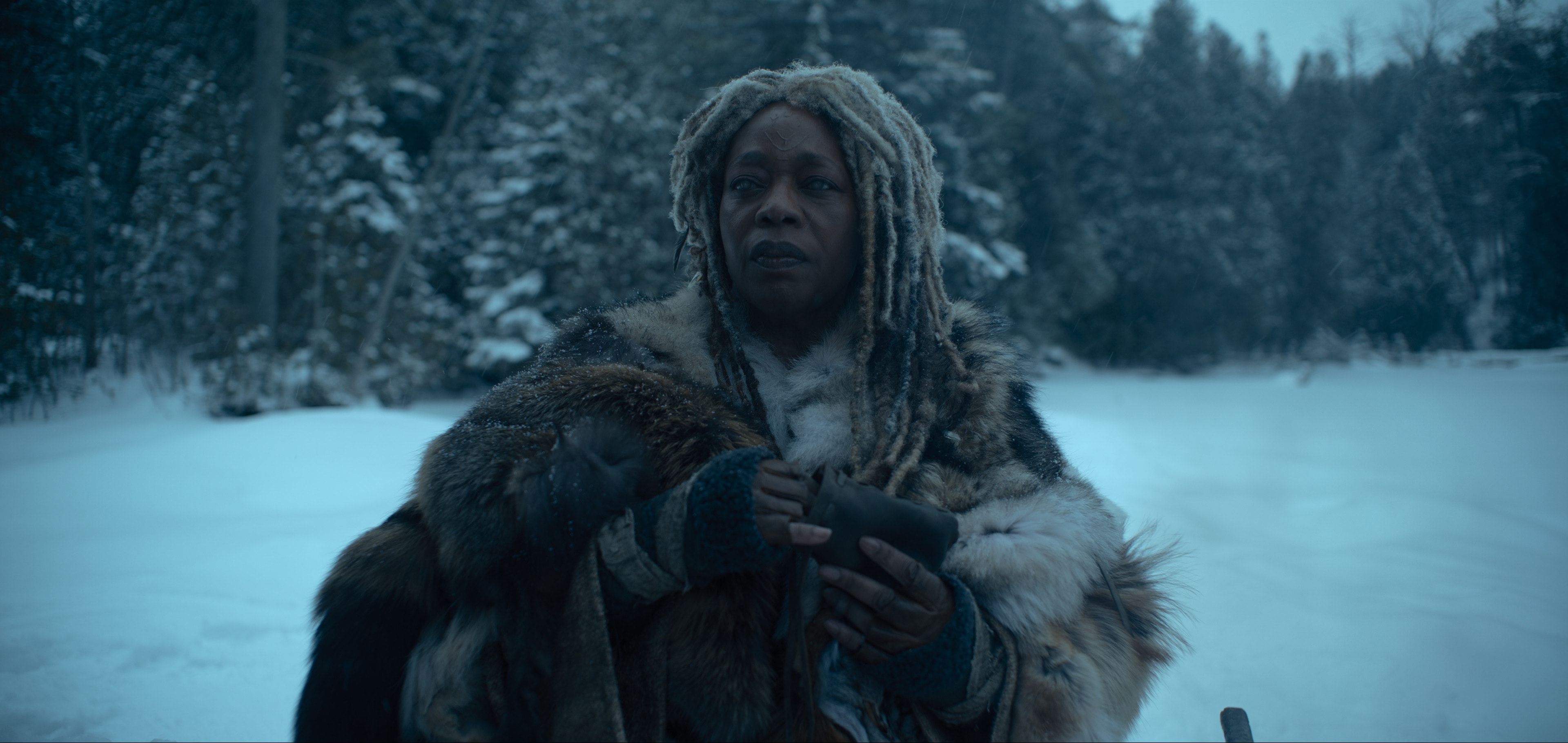 Alfre Woodard in a snowy forest wearing fur HD Wallpaper