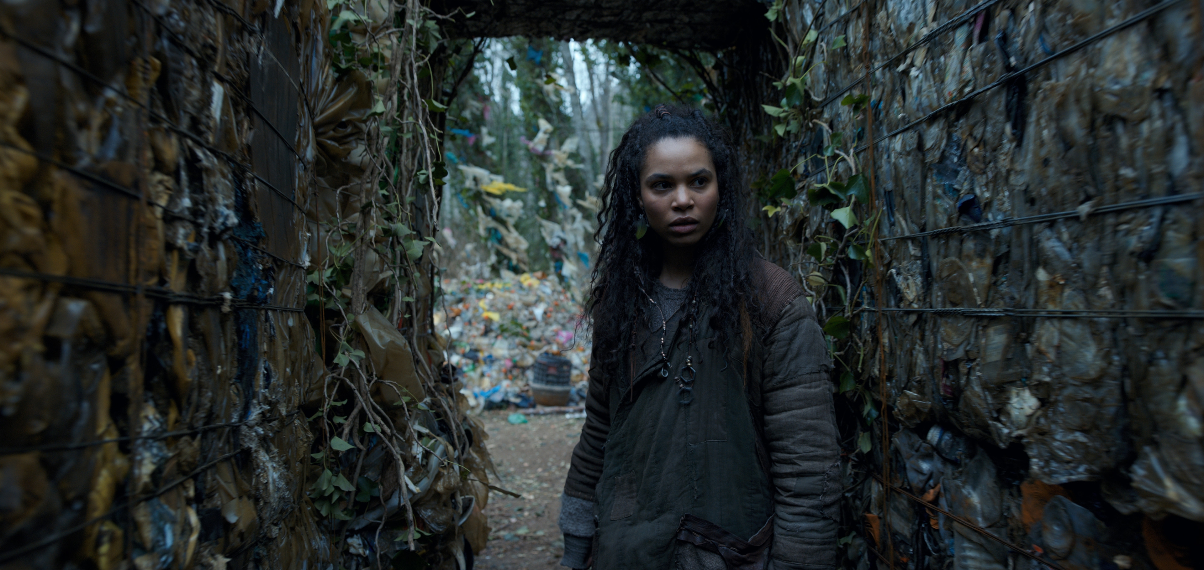 Nesta Cooper in a tunnel of compressed trash HD Wallpaper