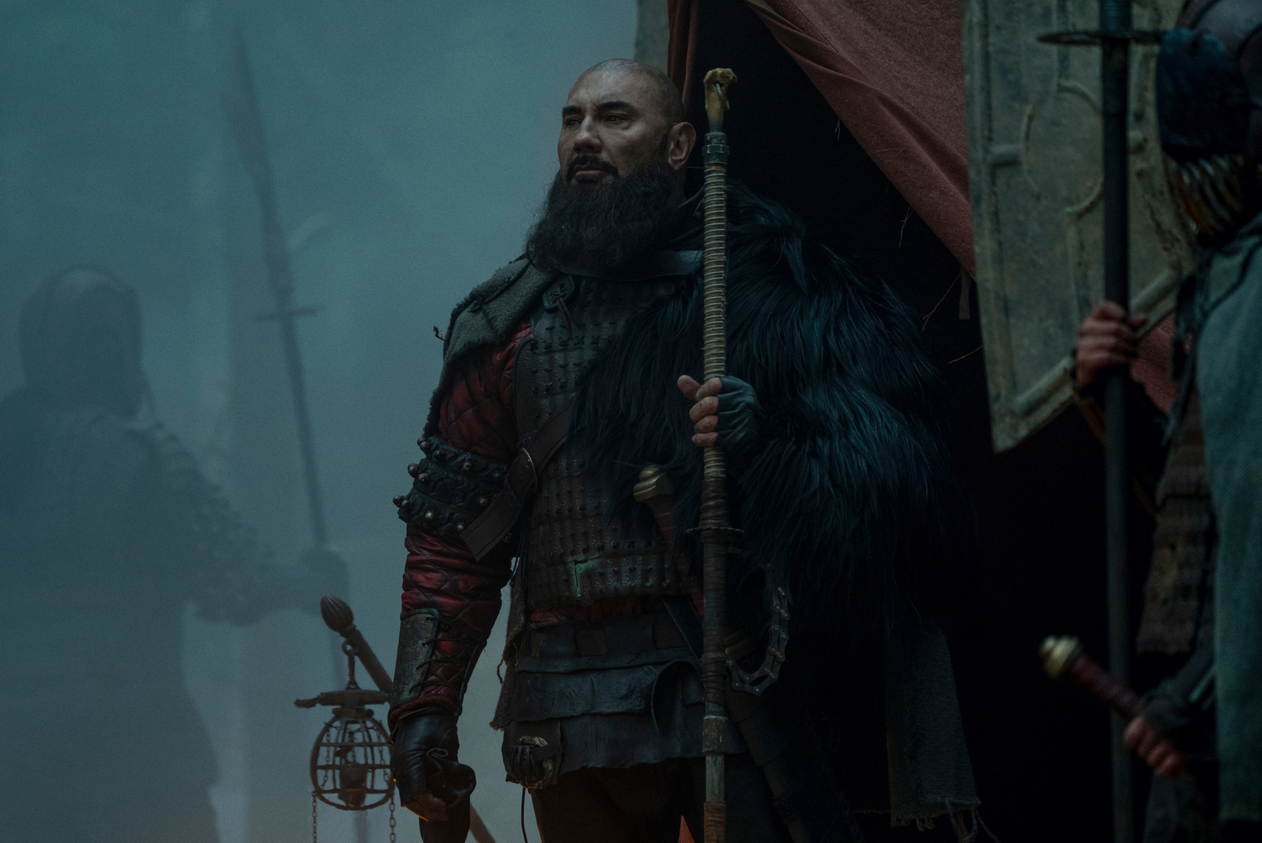 Dave Bautista as a bearded warrior with a staff HD Wallpaper