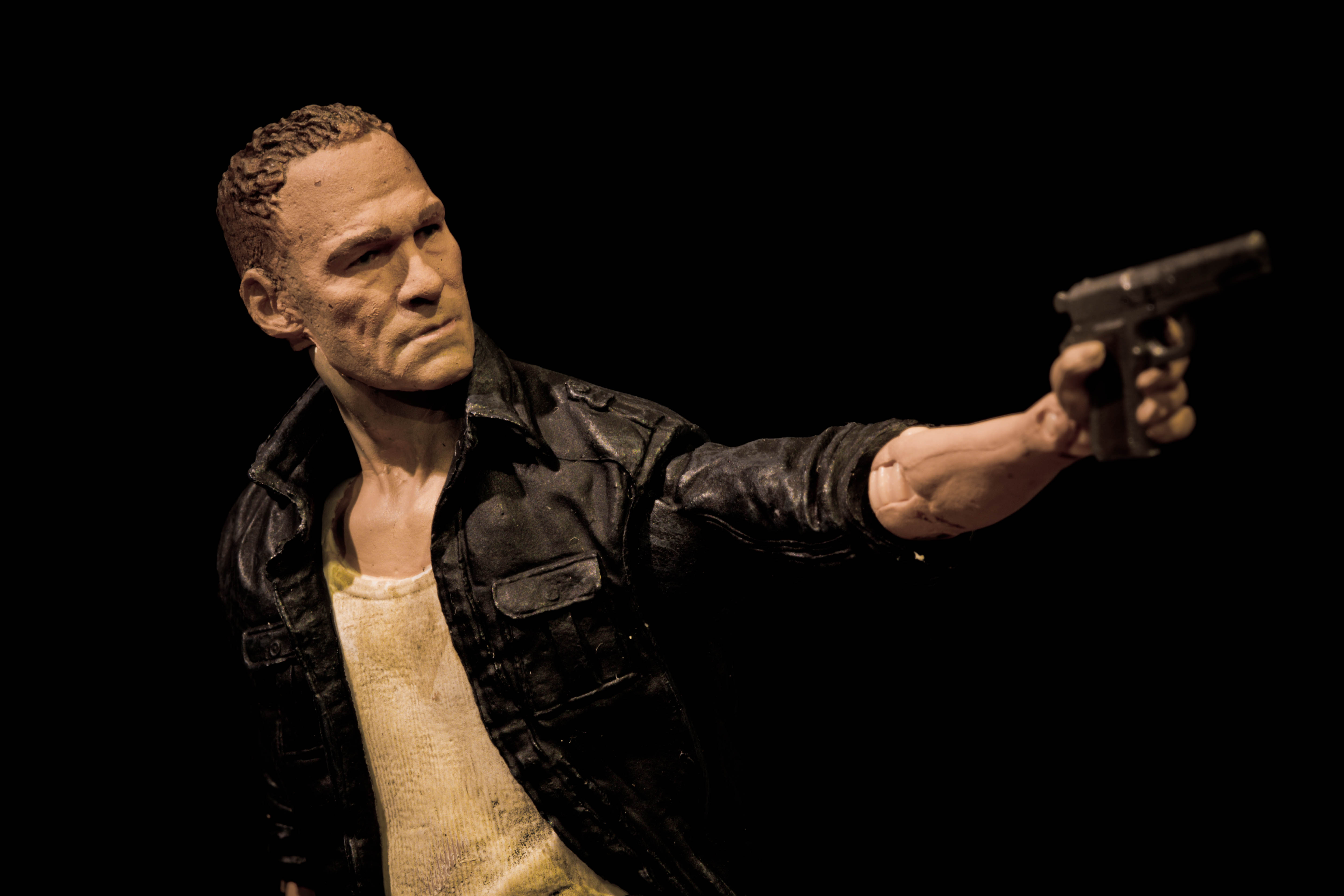Merle Dixon action figure with a gun HD Wallpaper
