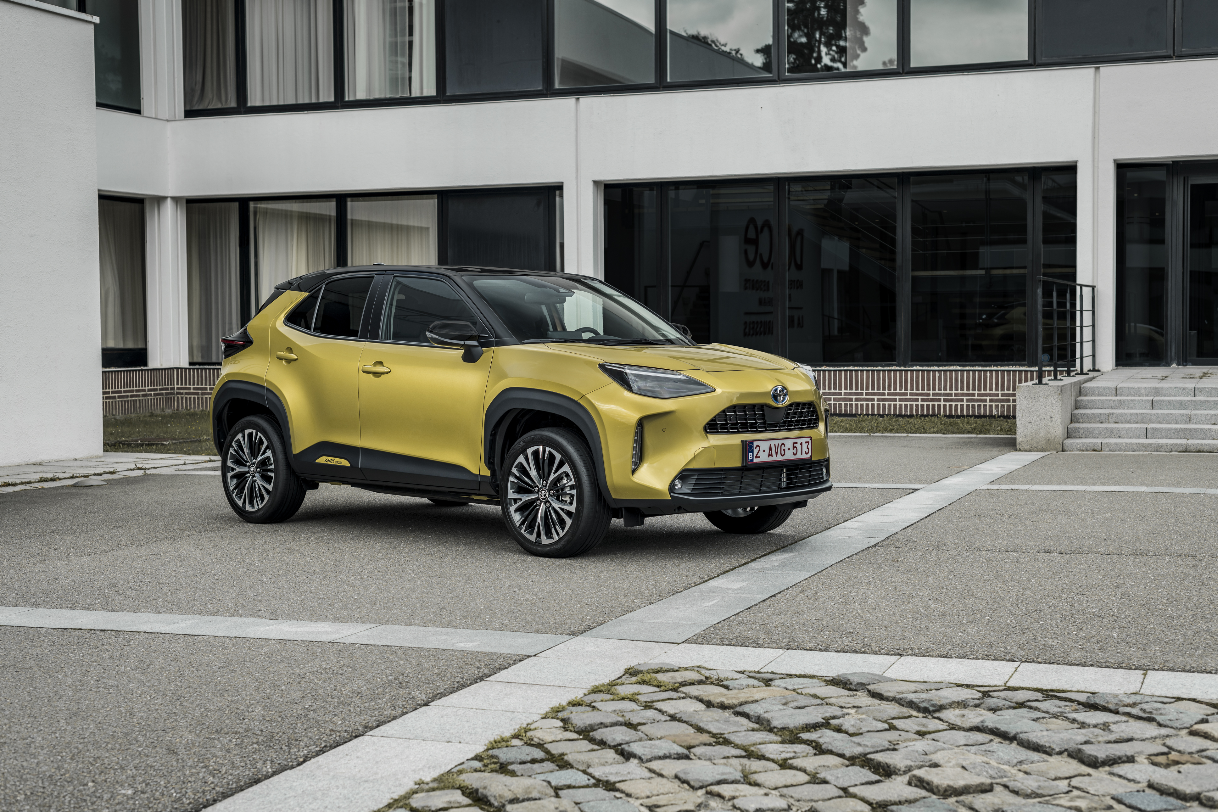Elegant Yellow Toyota Yaris Cross Hybrid SUV HD Wallpaper