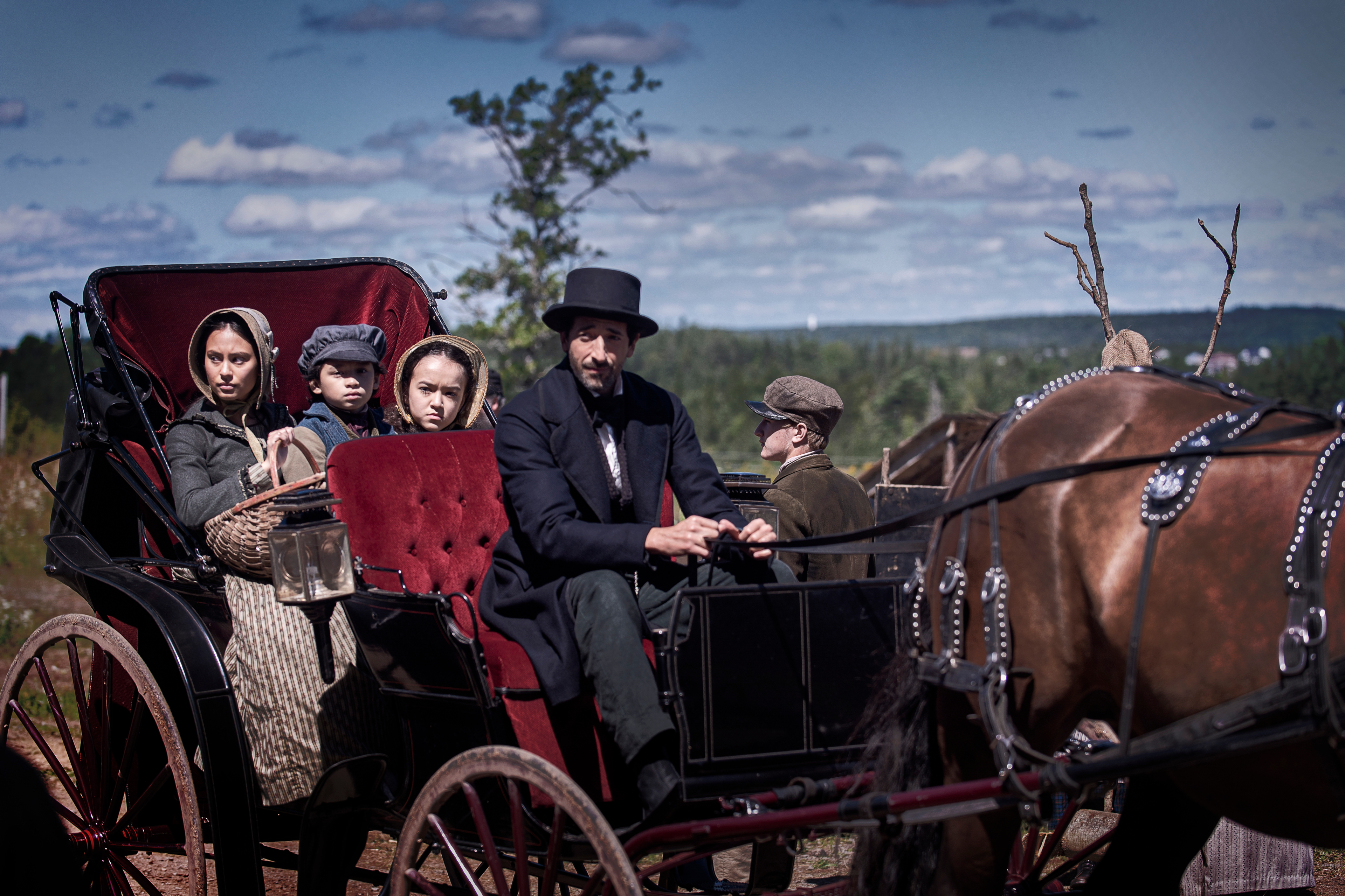 Adrien Brody and cast in Chapelwaite horse-drawn carriage HD Wallpaper