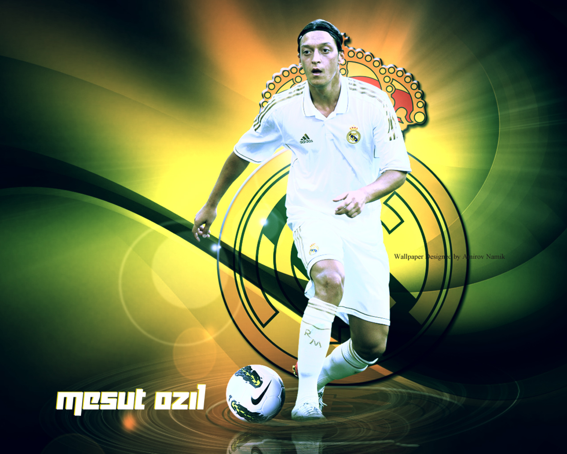 Mesut Özil dribbling football for Real Madrid HD Wallpaper