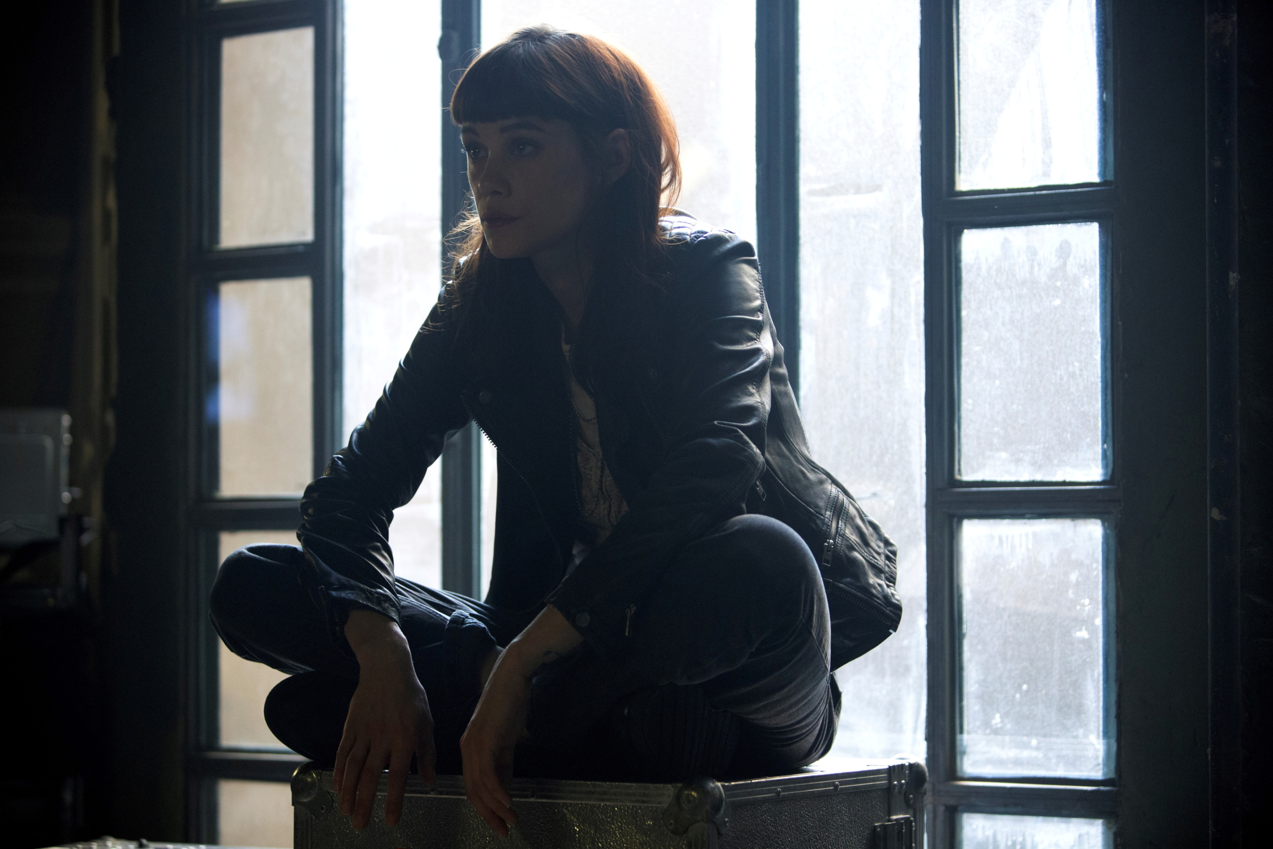Astrid Bergès-Frisbey in The Vault (2021) sitting by window HD Wallpaper
