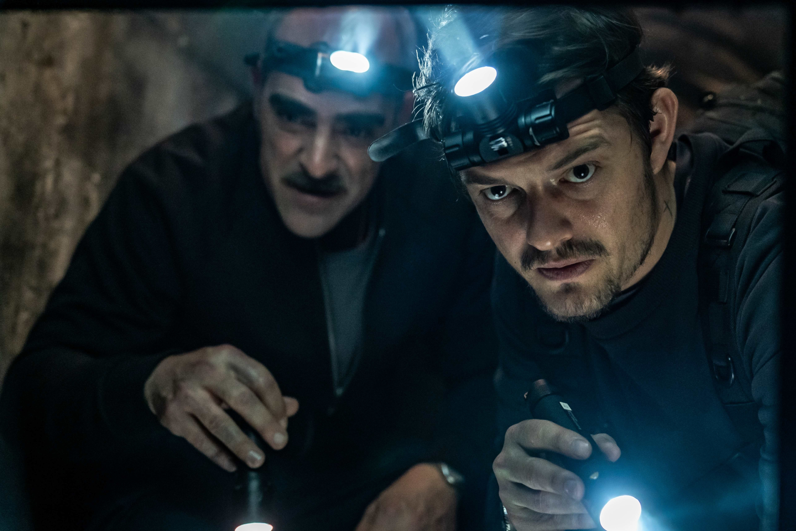 Sam Riley and Luis Tosar exploring in The Vault HD Wallpaper