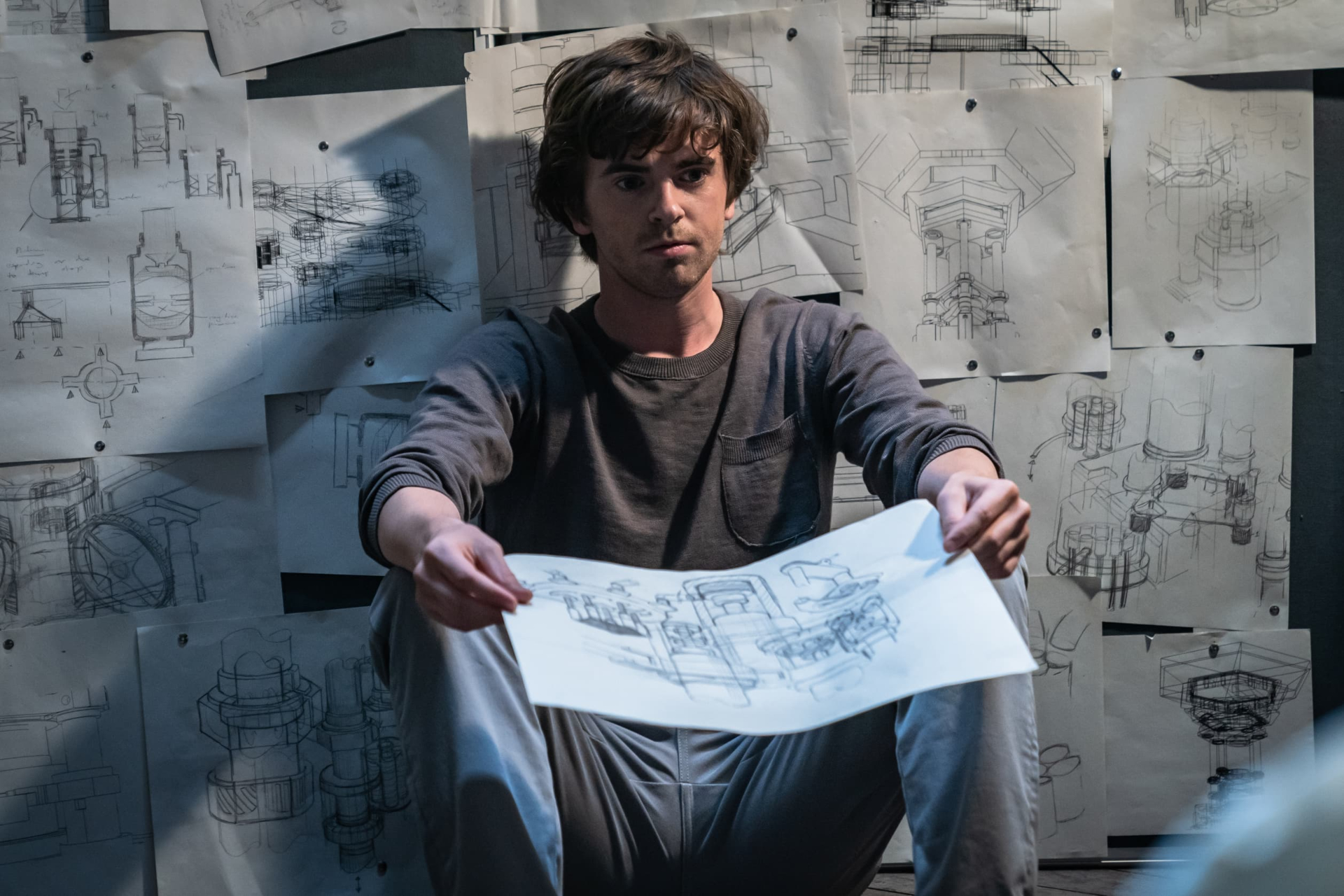 Freddie Highmore holding a drawing in The Vault HD Wallpaper