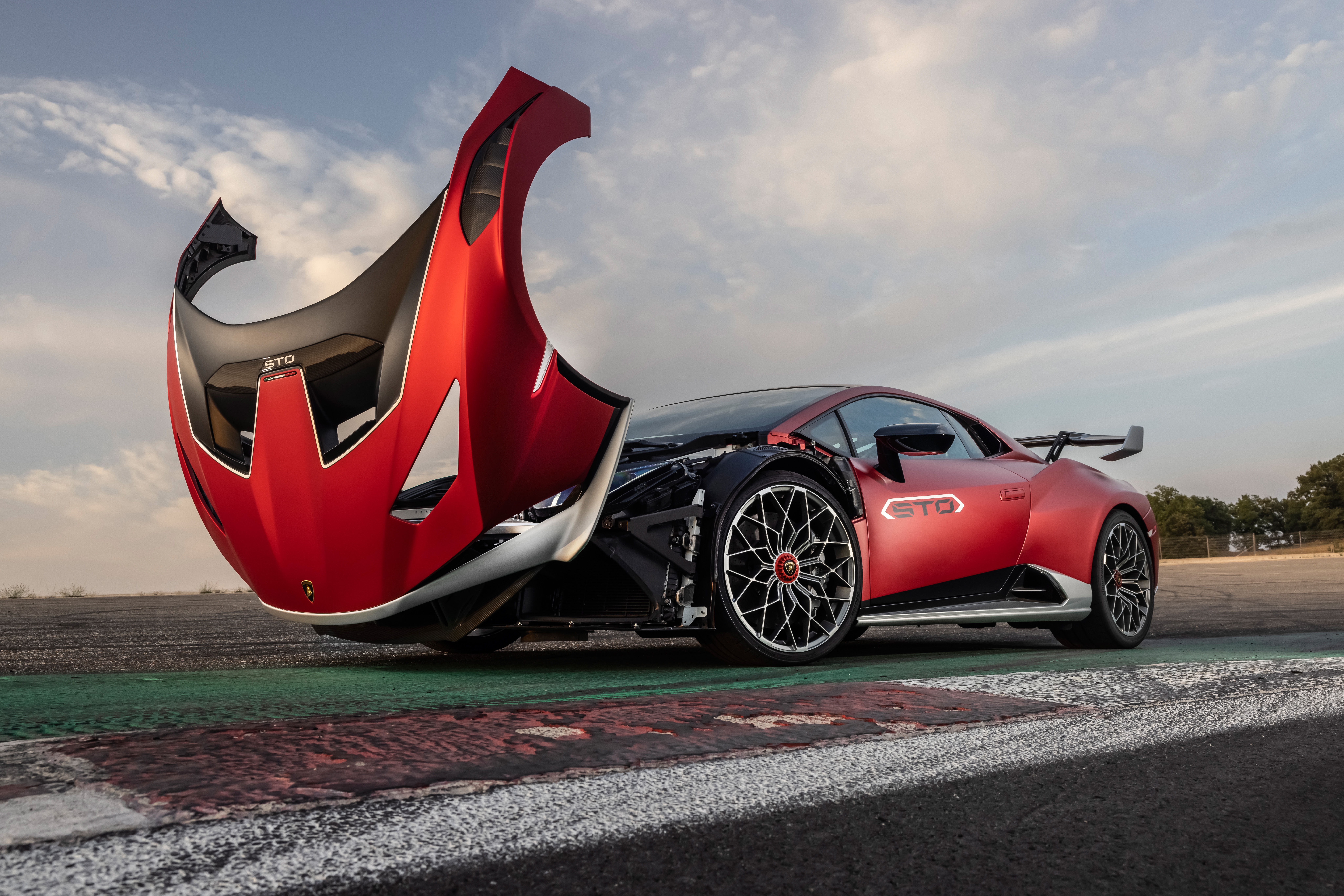 Red Lamborghini Huracán STO Supercar with Open Front HD Wallpaper