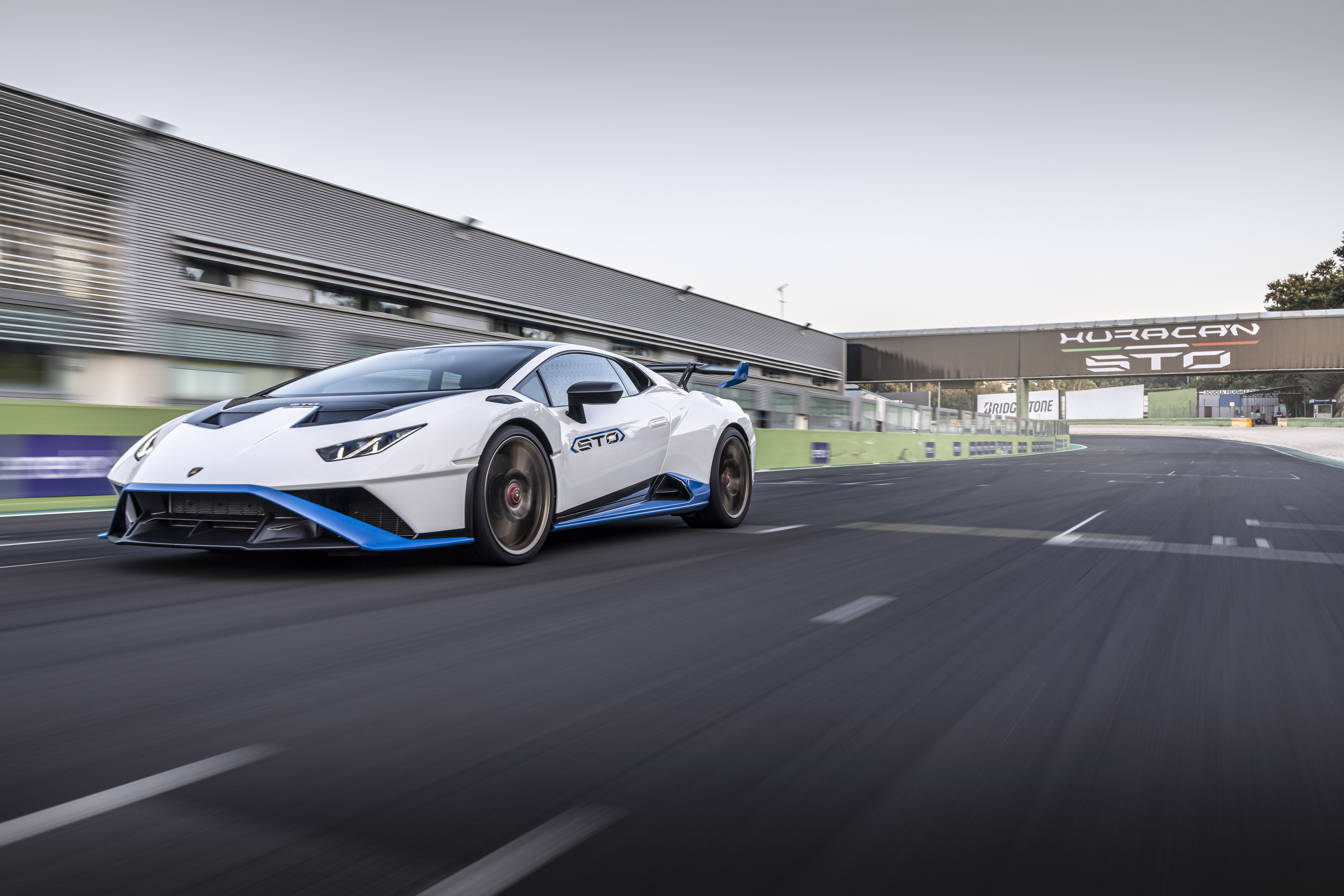 Lamborghini Huracán STO supercar speeding on track HD Wallpaper