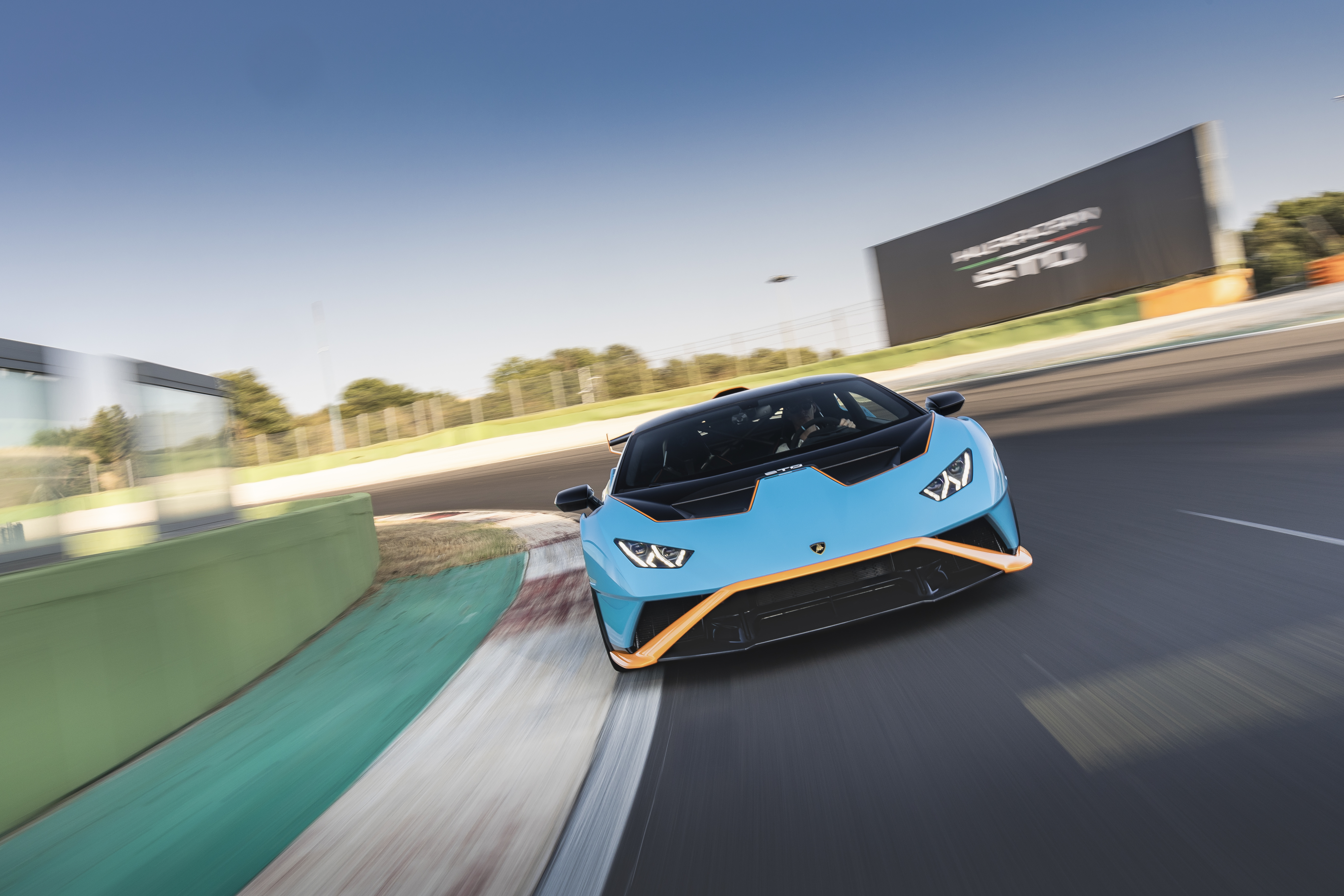 Blue Lamborghini Huracán STO Supercar Cornering on Track HD Wallpaper