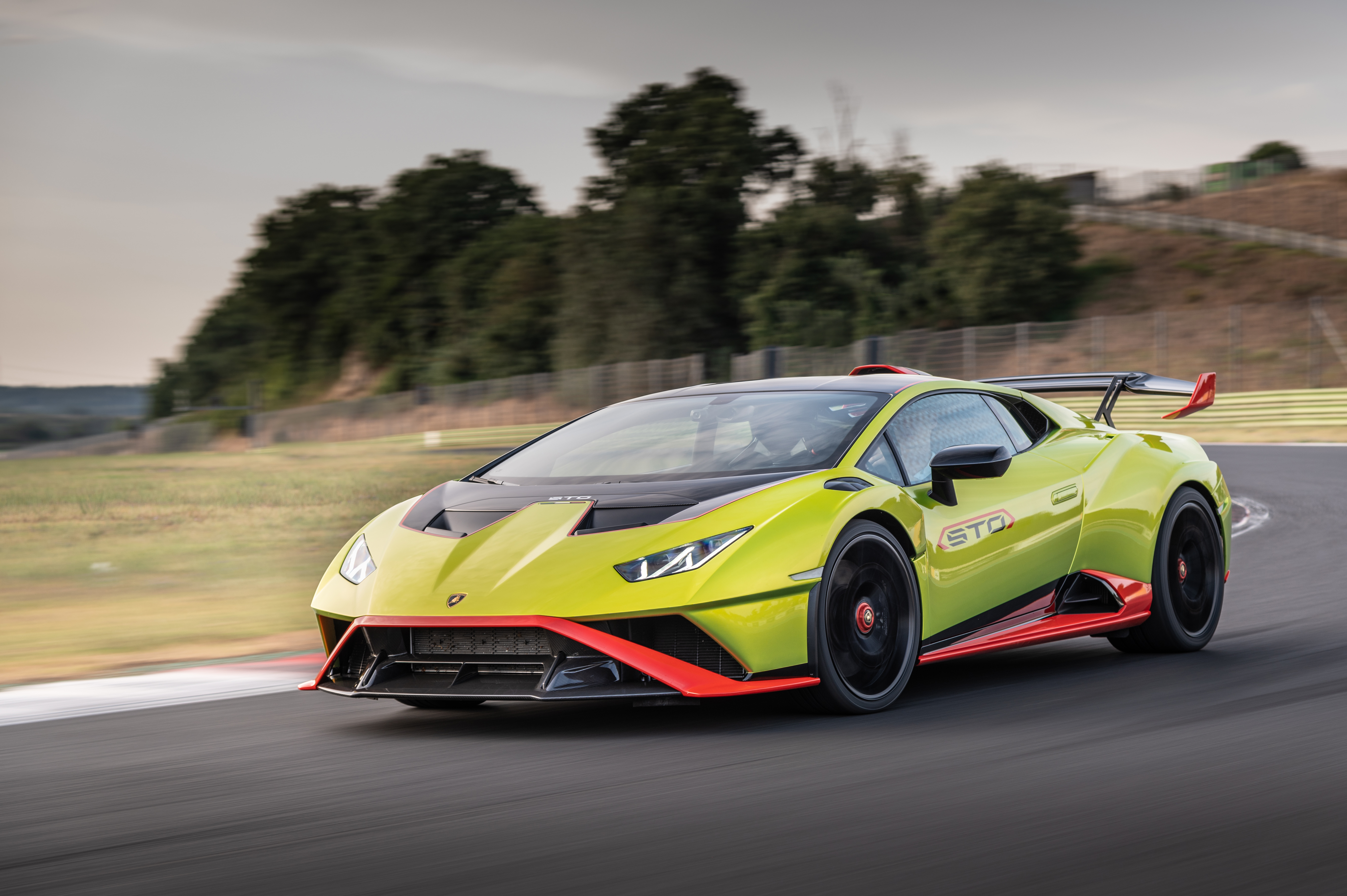 Green Lamborghini Huracán STO Supercar on Track 4K HD Wallpaper