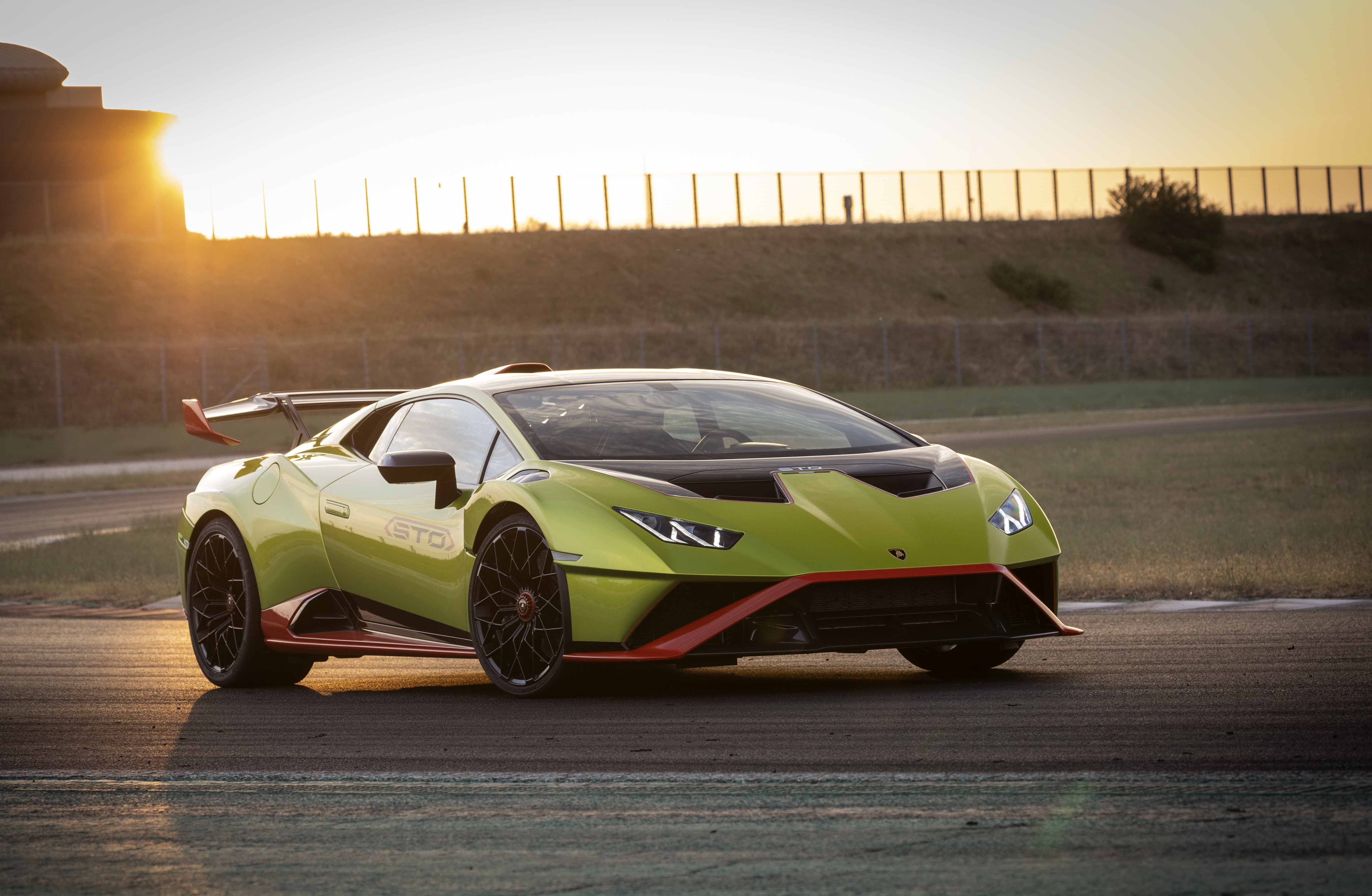 Green Lamborghini Huracán STO Supercar at Sunset HD Wallpaper