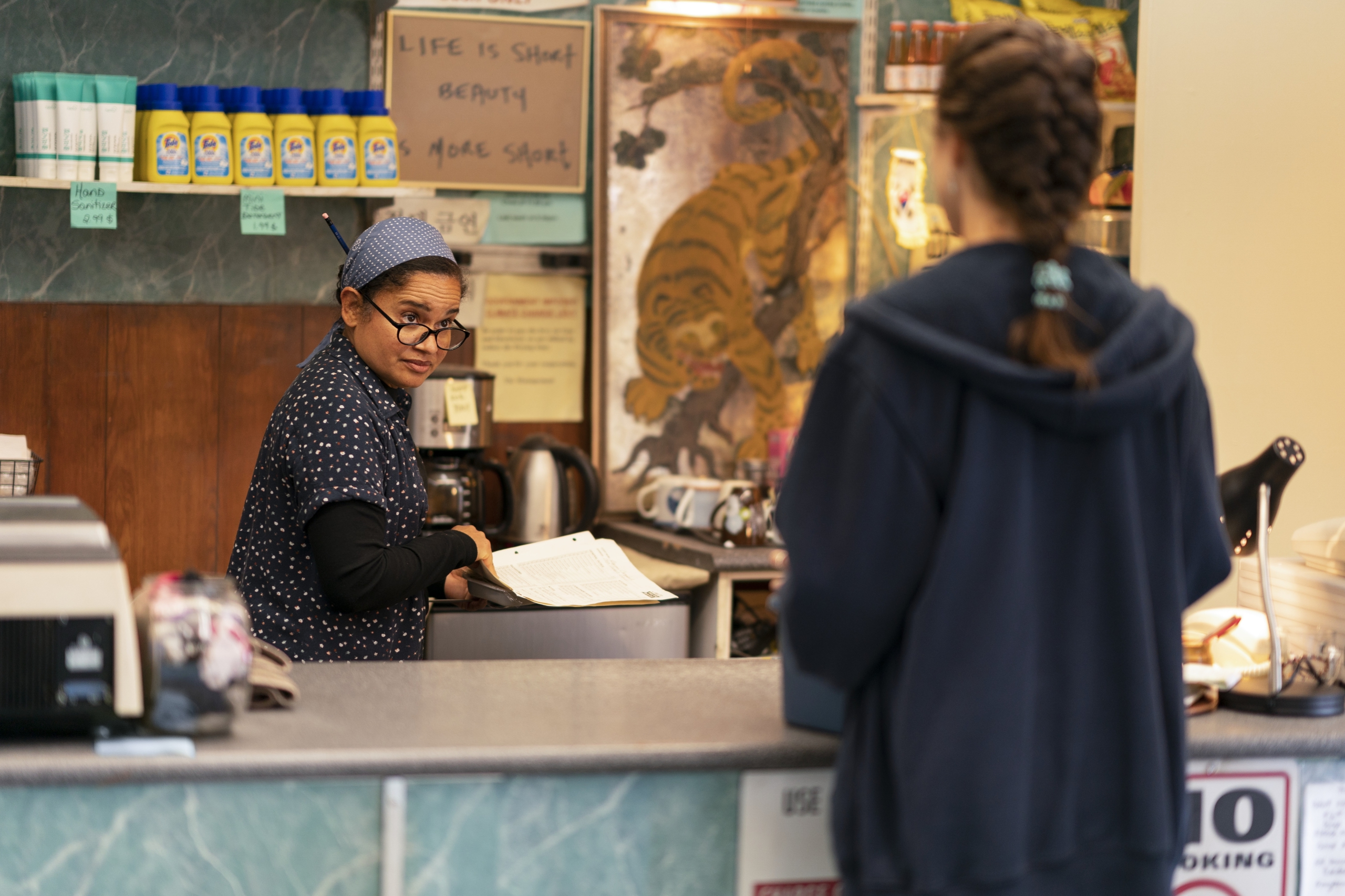 Tracy Vilar behind counter in Maid HD Wallpaper