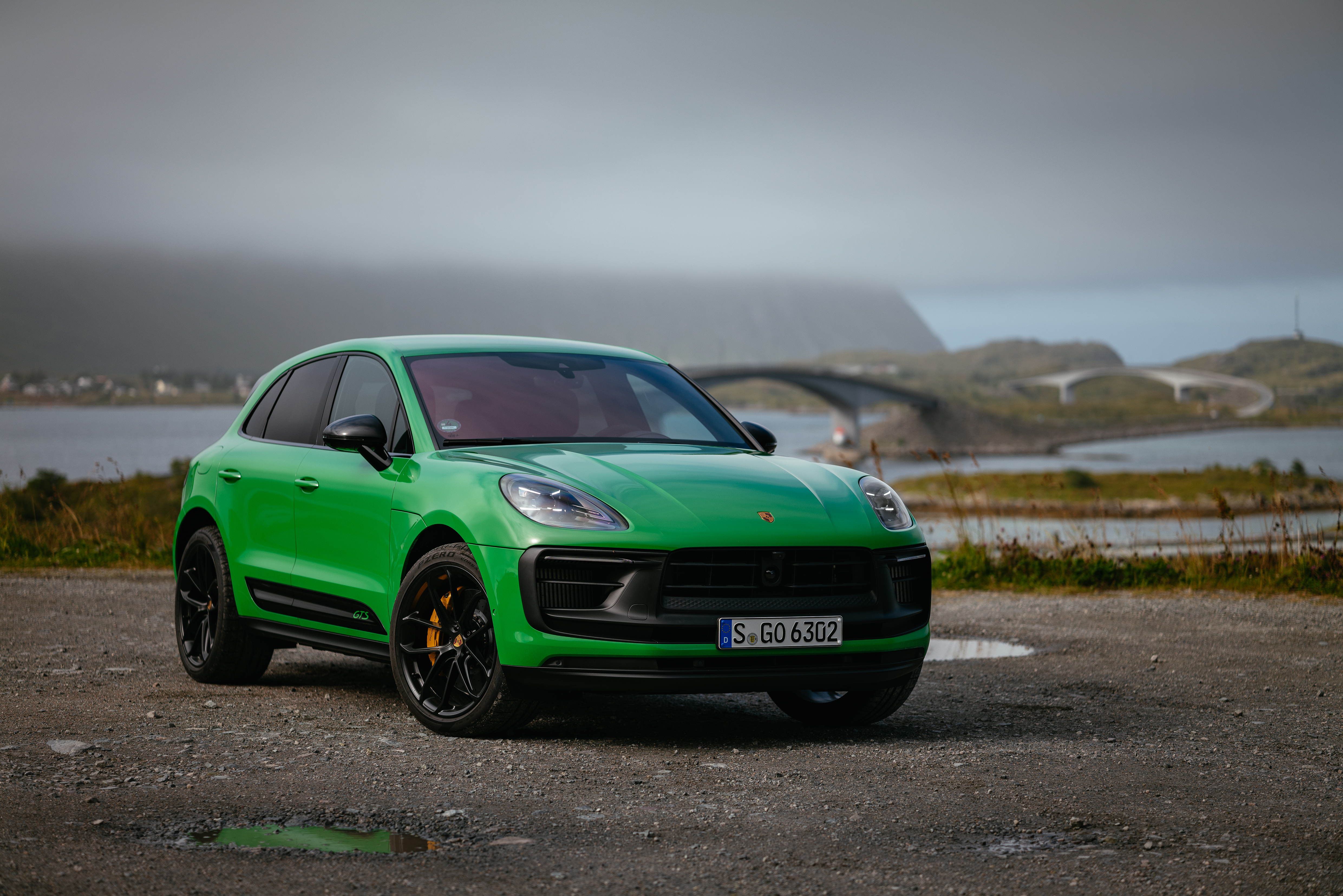 Green Porsche Macan GTS SUV by the water HD Wallpaper