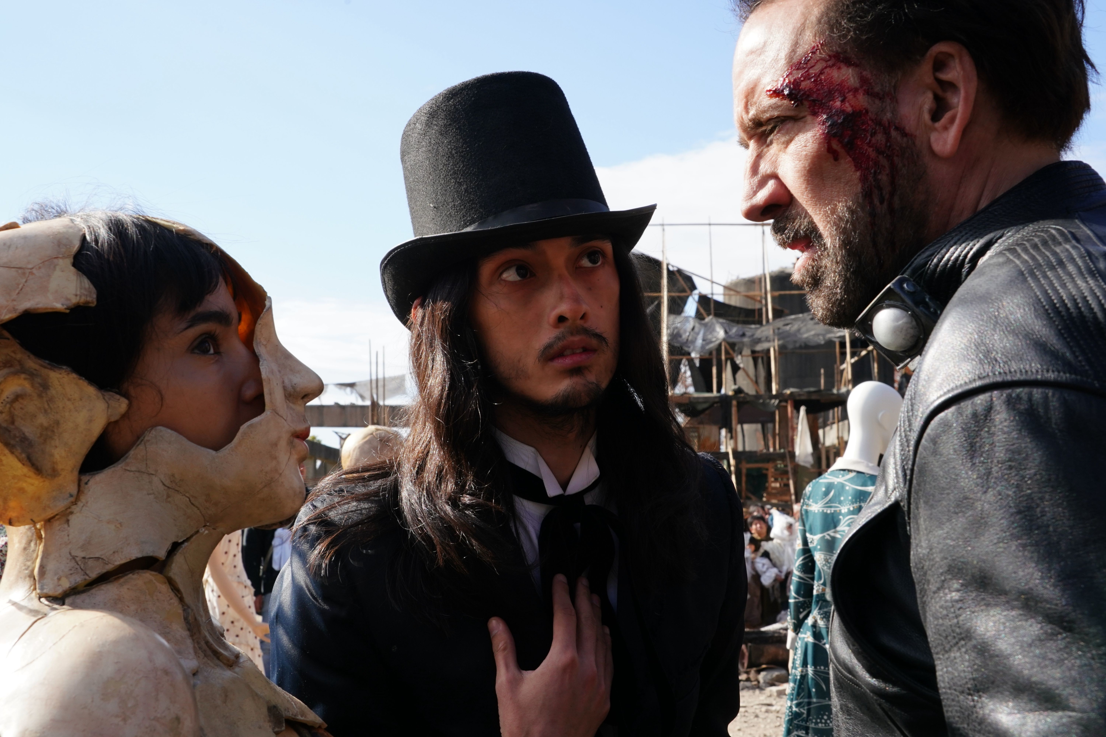 Nicolas Cage, man in top hat, and masked figure in Ghostland HD Wallpaper