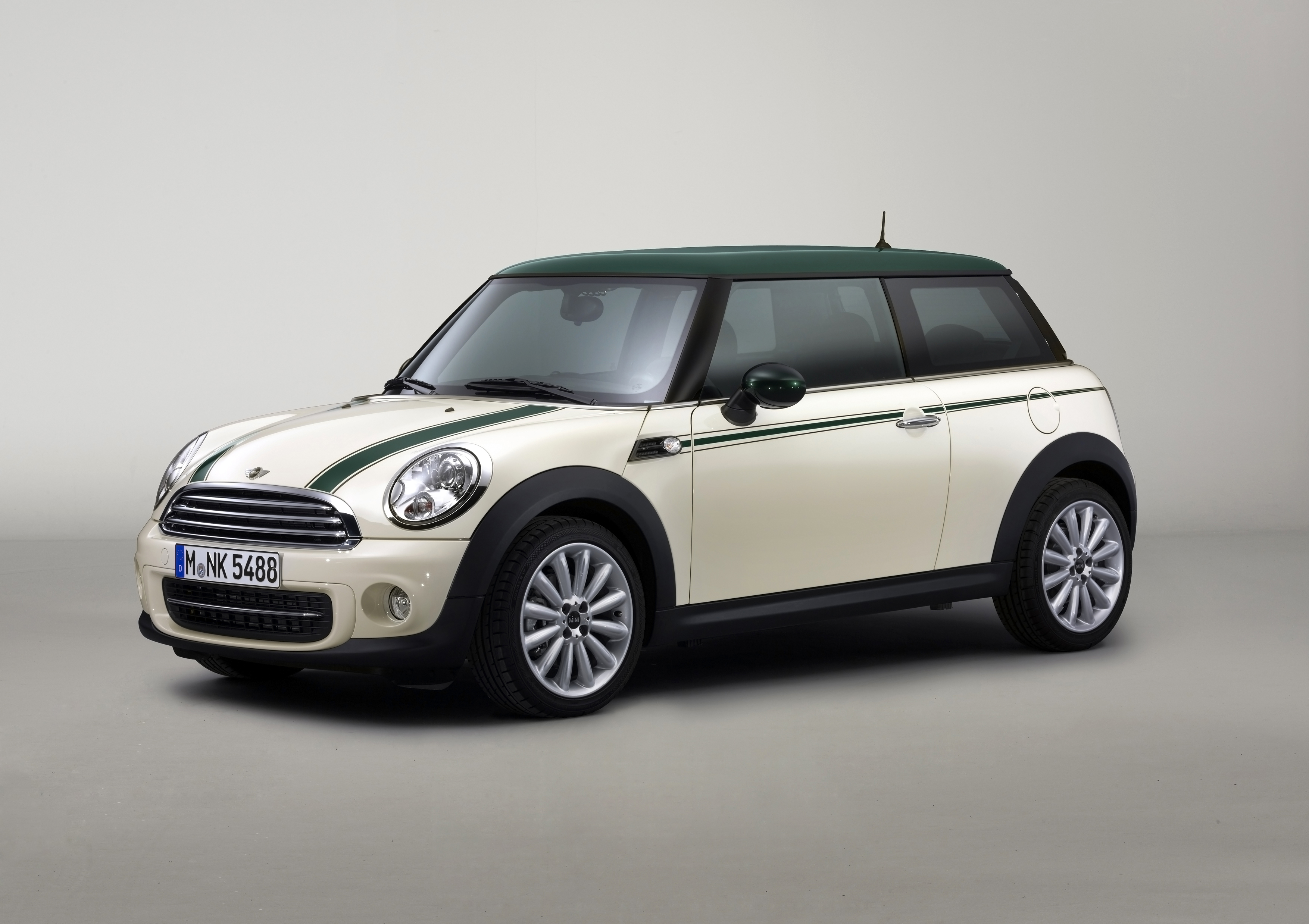 2012 Mini Cooper Green Park in white and green HD Wallpaper