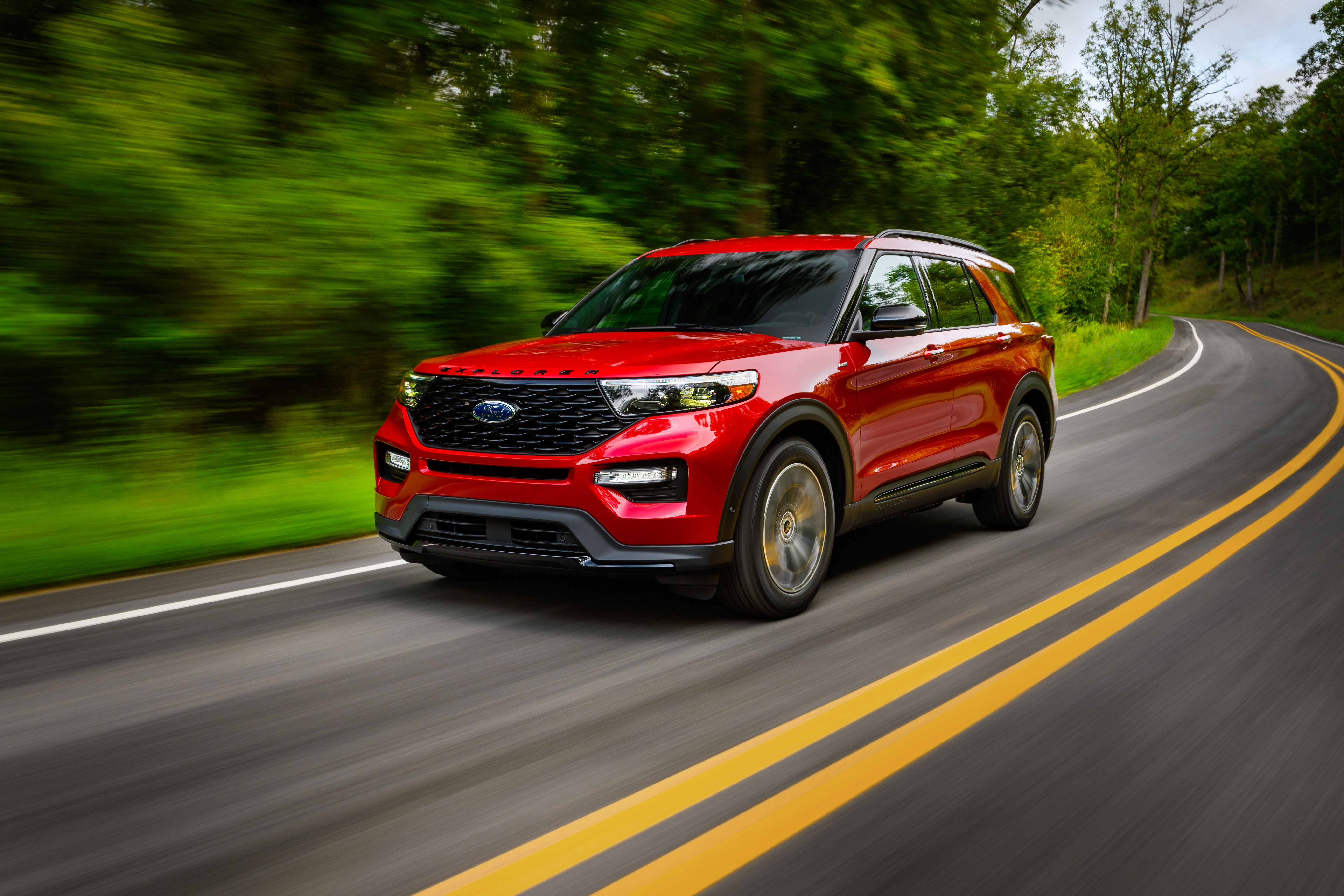 2022 Red Ford Explorer ST-Line SUV on winding road HD Wallpaper