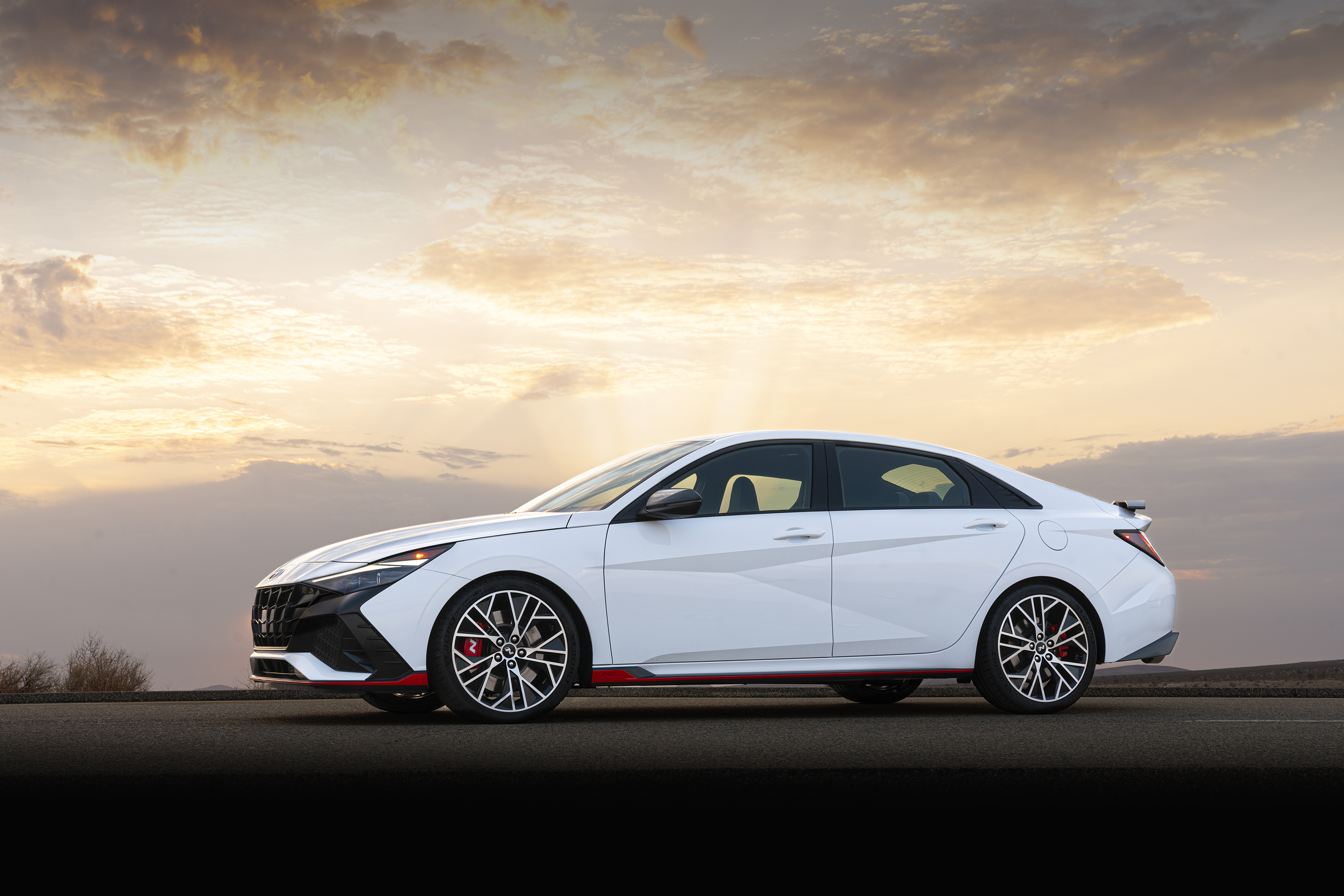 White 2022 Hyundai Elantra N Sport Car at Sunset HD Wallpaper