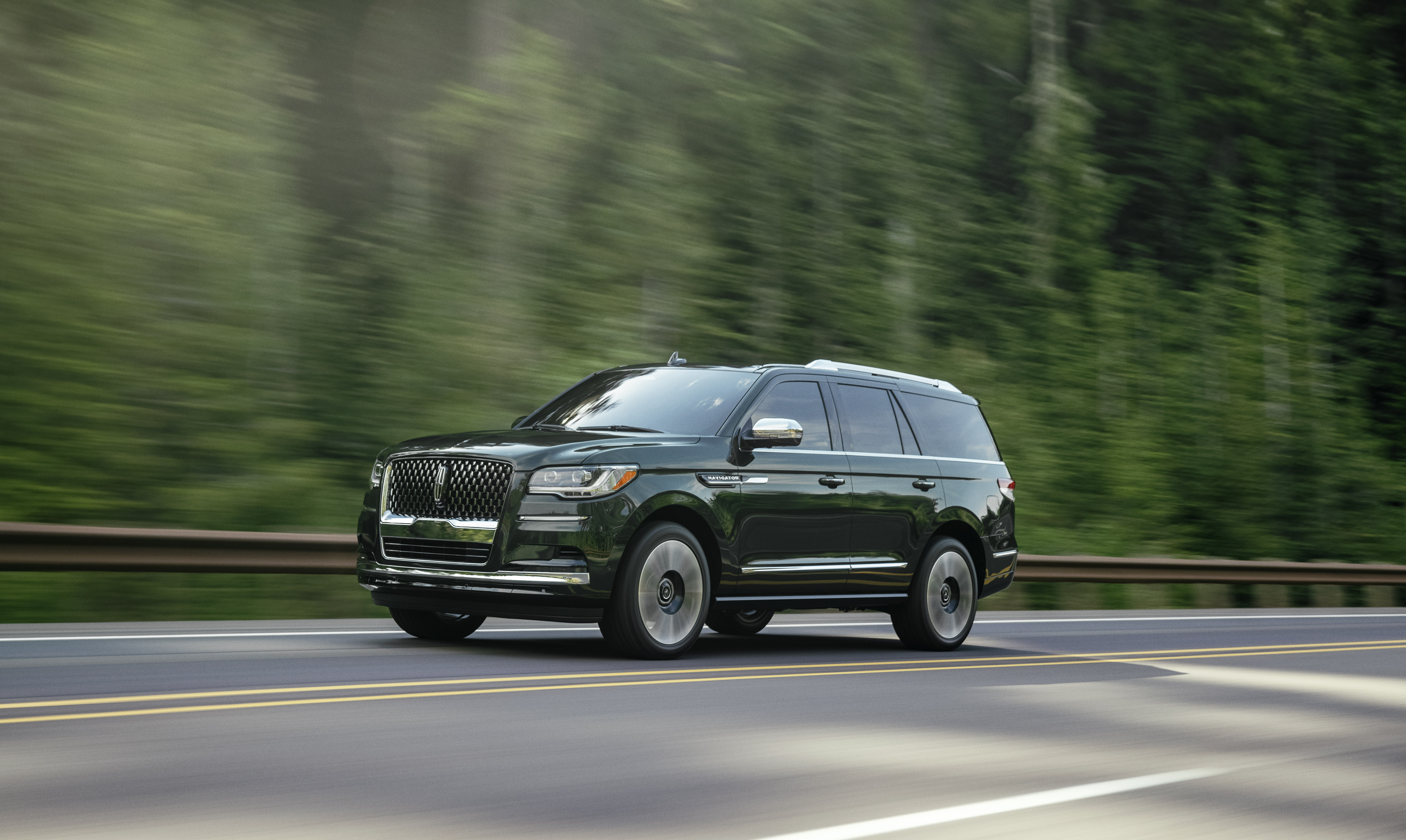 Dark Green Lincoln Navigator Black Label SUV driving HD Wallpaper