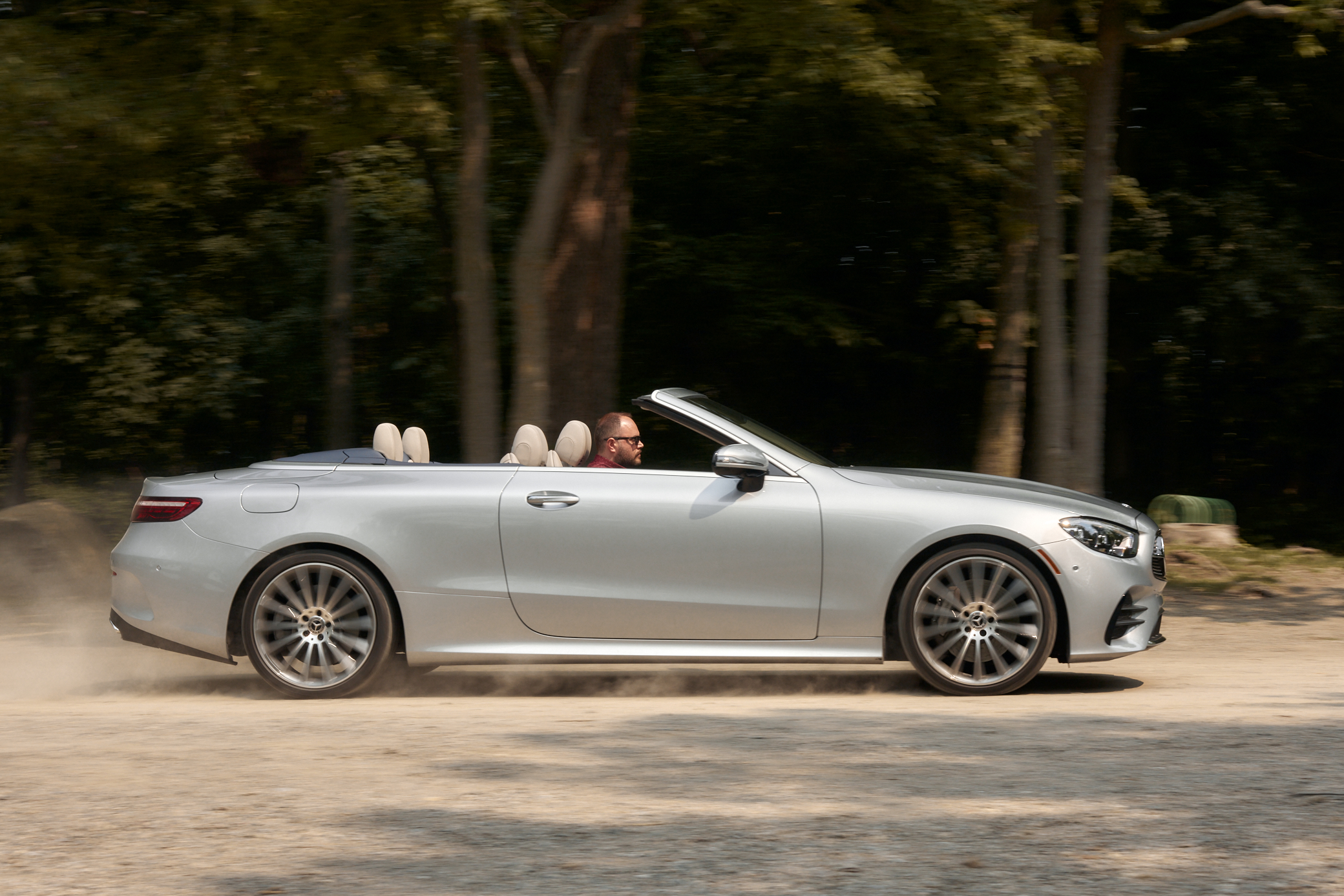 Silver Mercedes-Benz E 450 Cabriolet on a dusty road HD Wallpaper