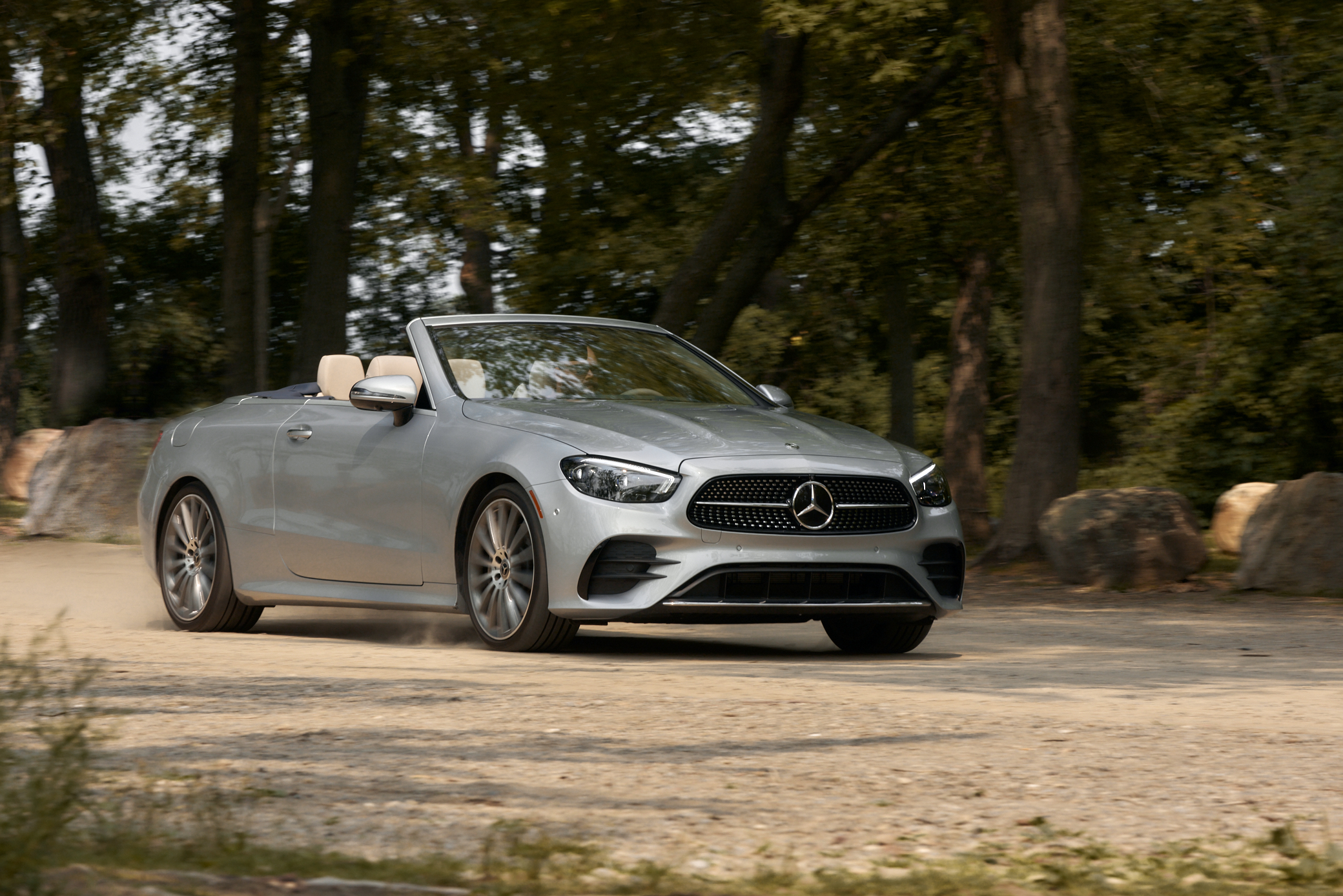 Silver Mercedes-Benz E 450 Cabriolet driving on a dirt road HD Wallpaper