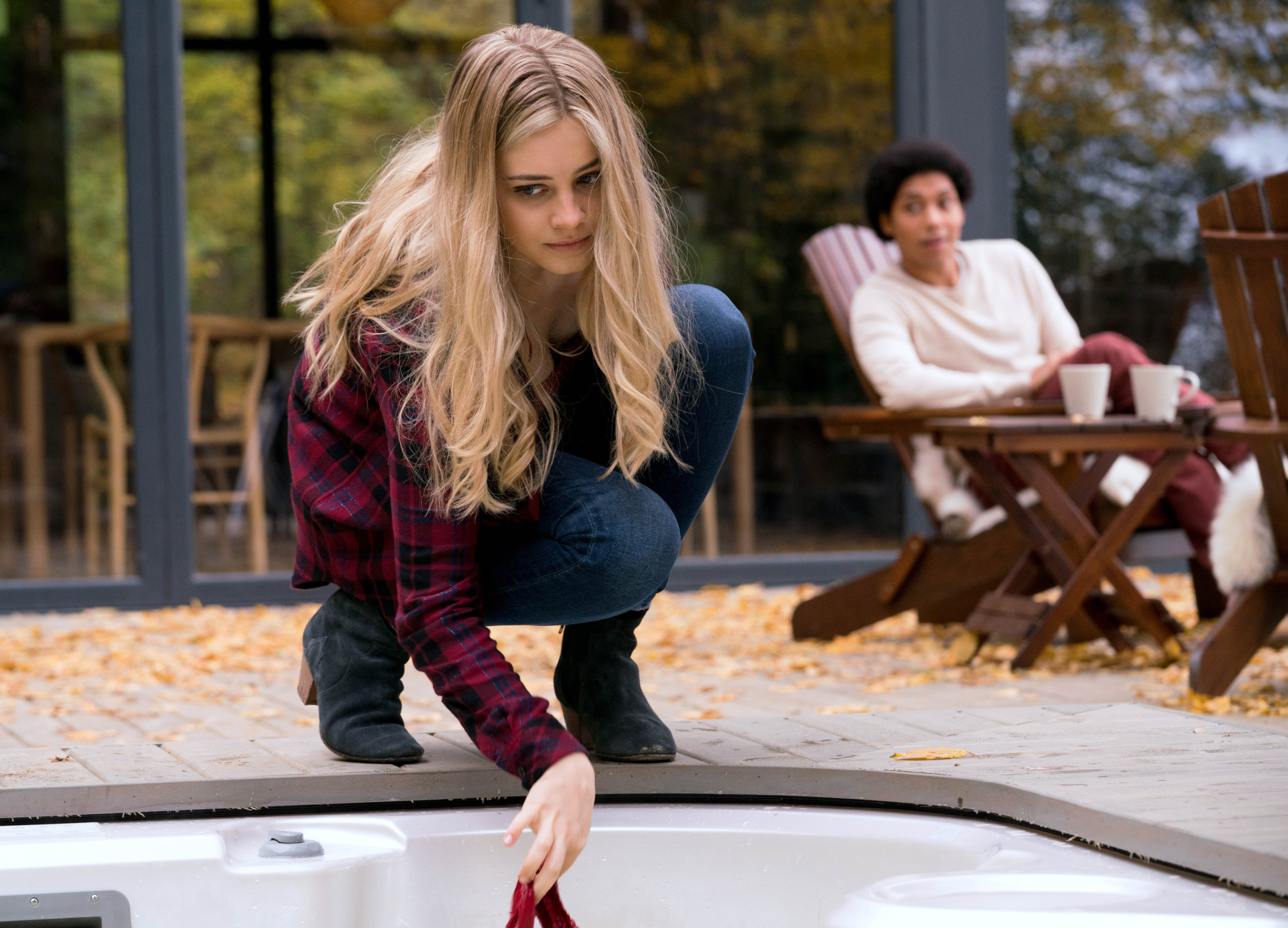 Josephine Langford crouching by hot tub in After We Fell HD Wallpaper