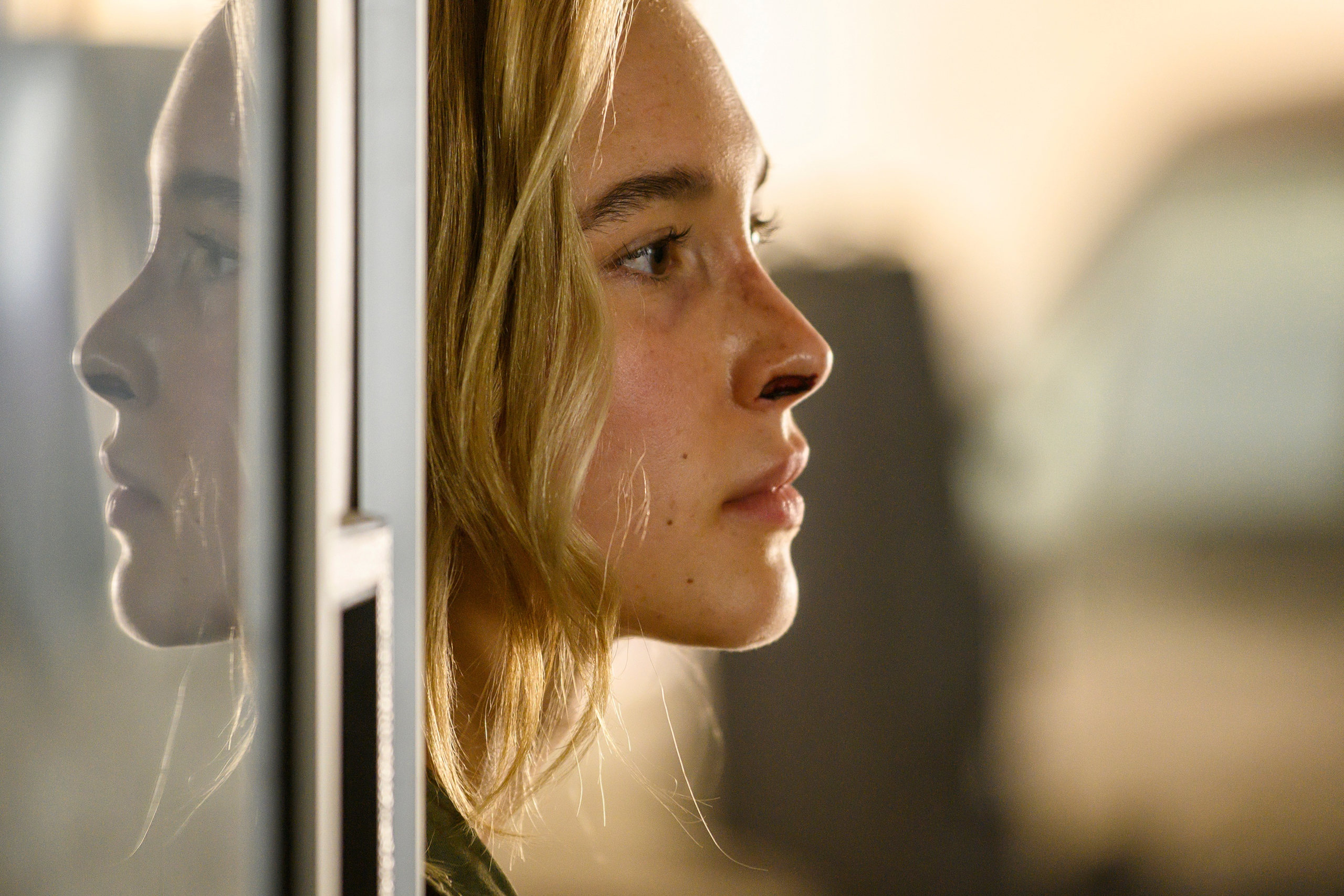 Isabel May's profile and reflection from Run Hide Fight HD Wallpaper
