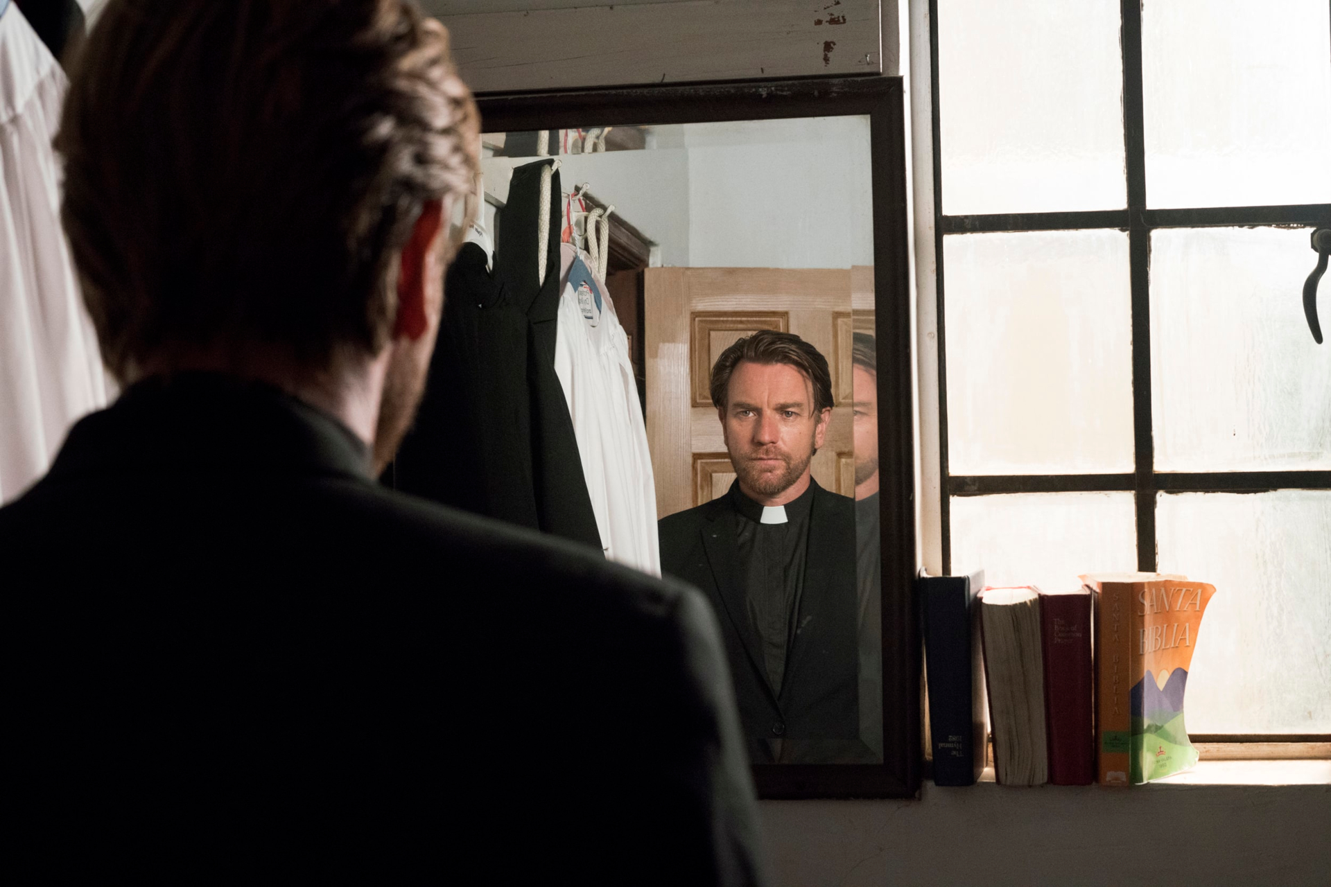 Ewan McGregor reflects as a priest in The Birthday Cake HD Wallpaper