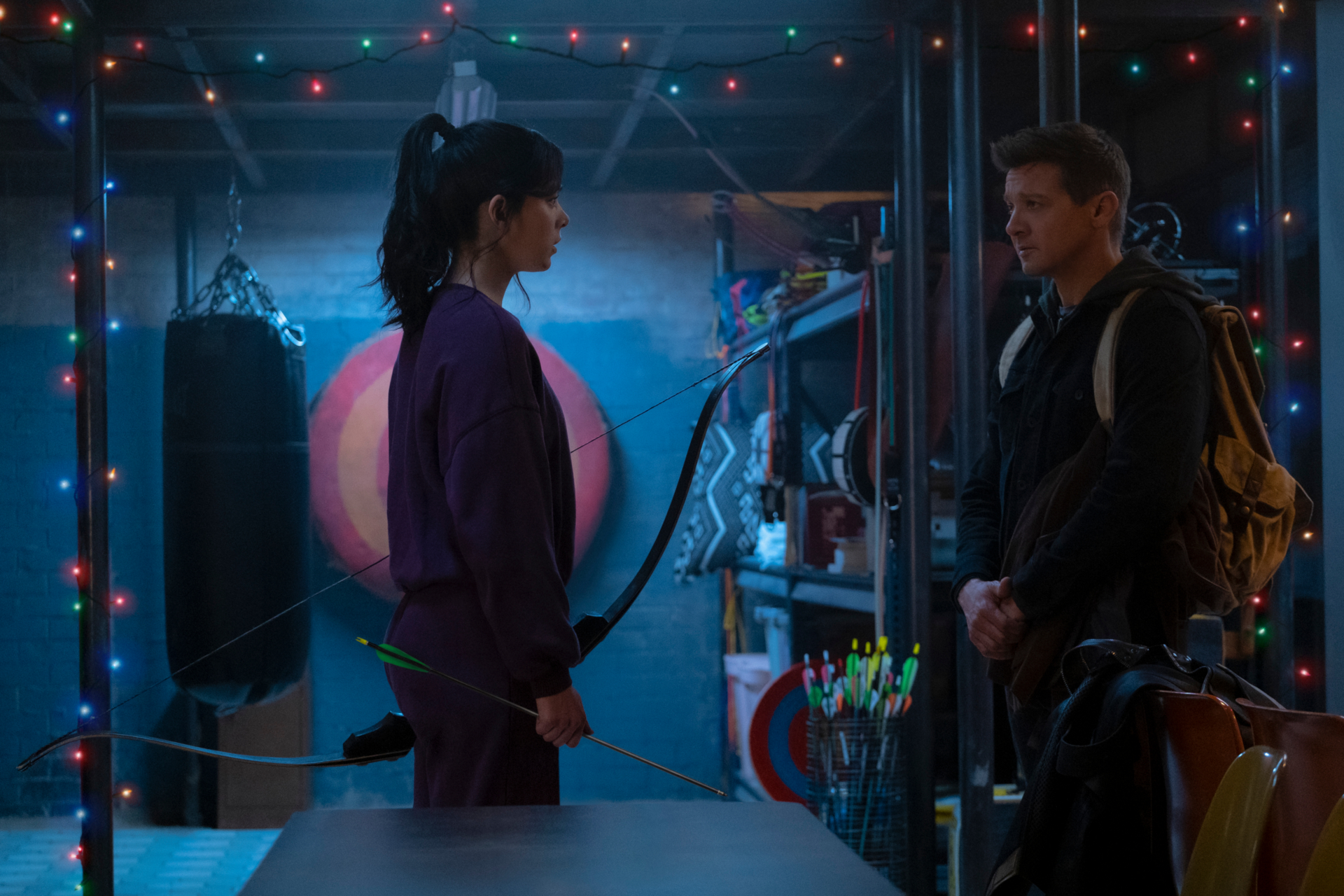 Hailee Steinfeld and Jeremy Renner in Dimly Lit Room HD Wallpaper