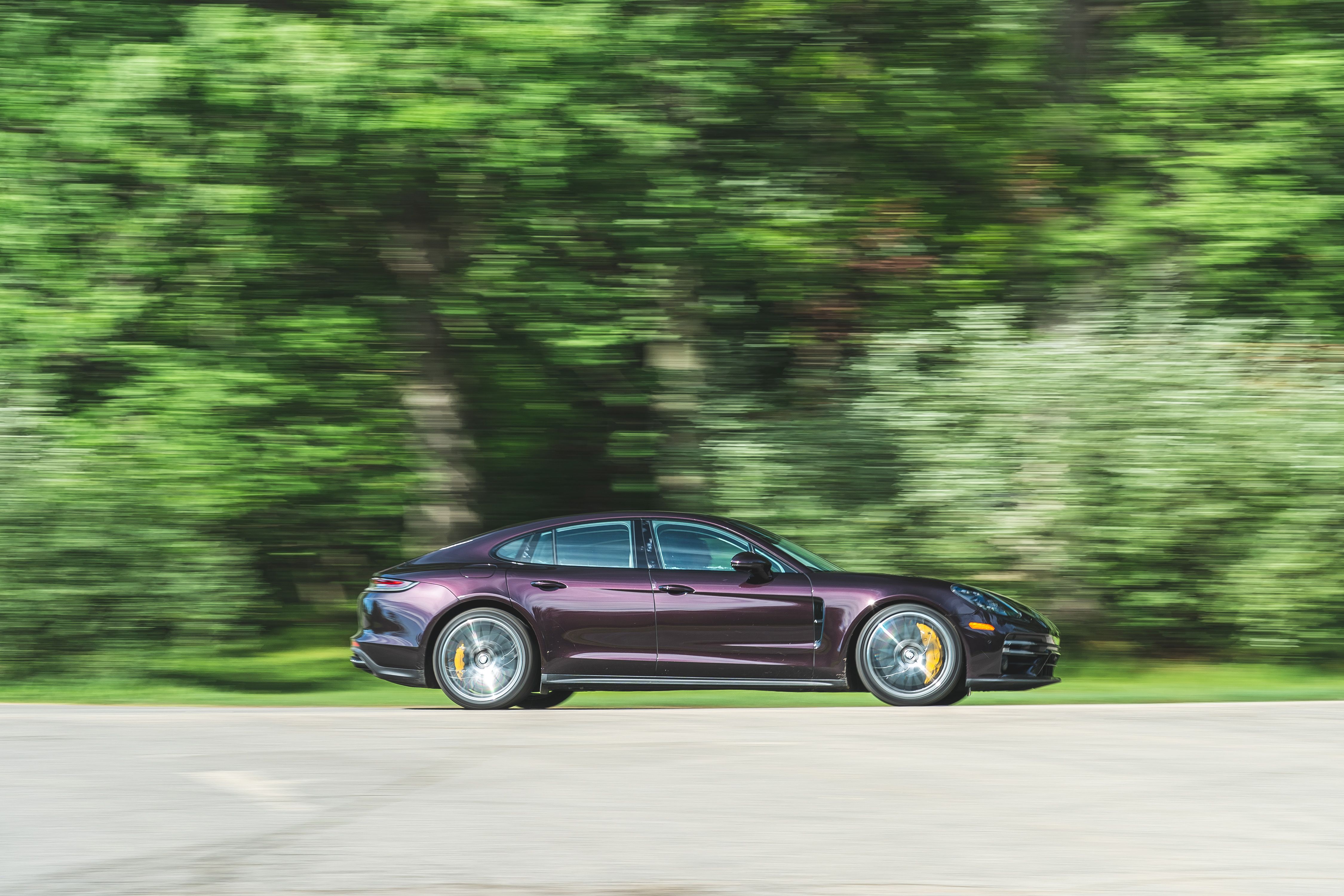 2021 Purple Porsche Panamera Turbo S in motion HD Wallpaper