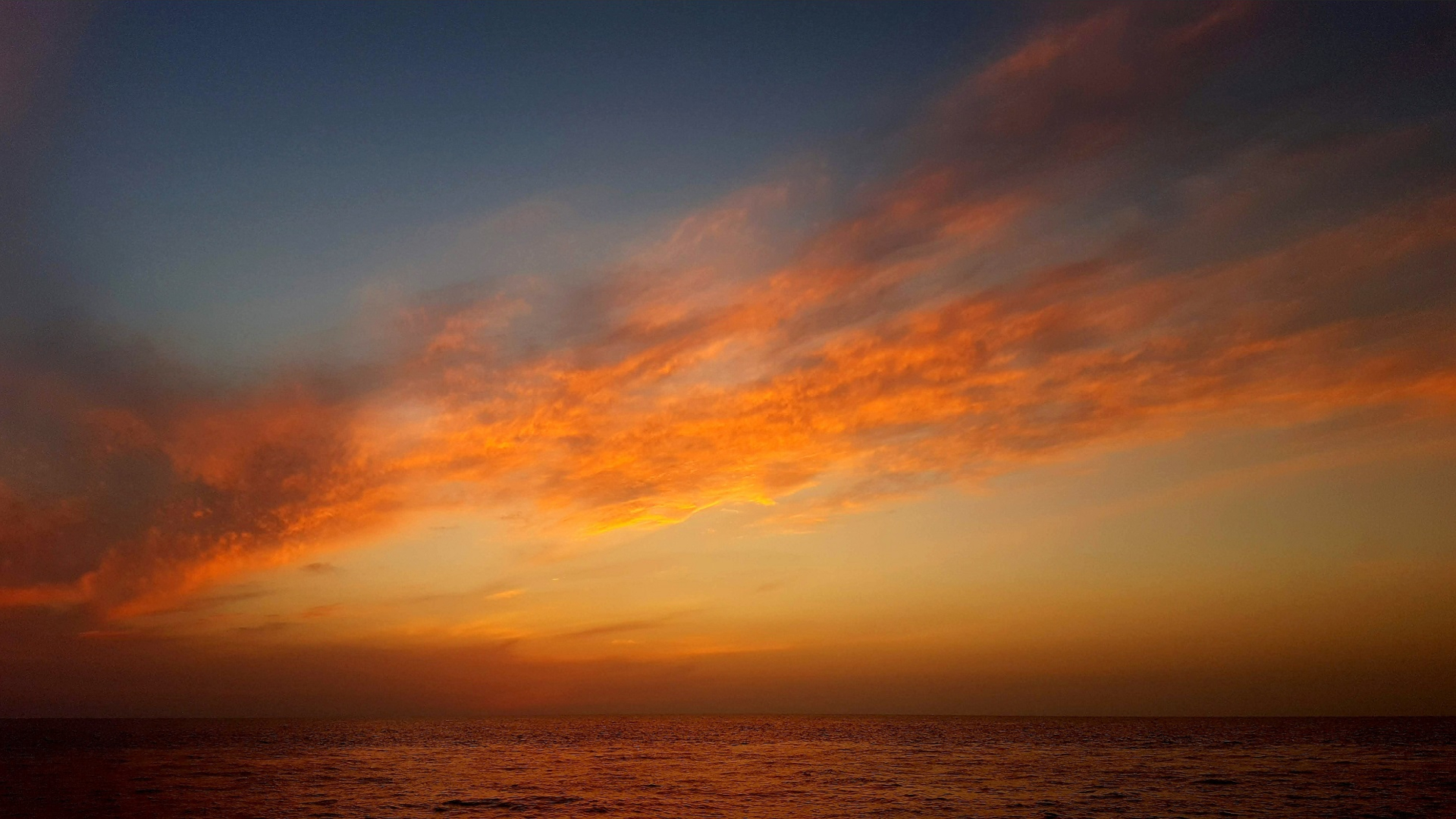 Fiery Sunset Clouds over the Ocean HD Wallpaper