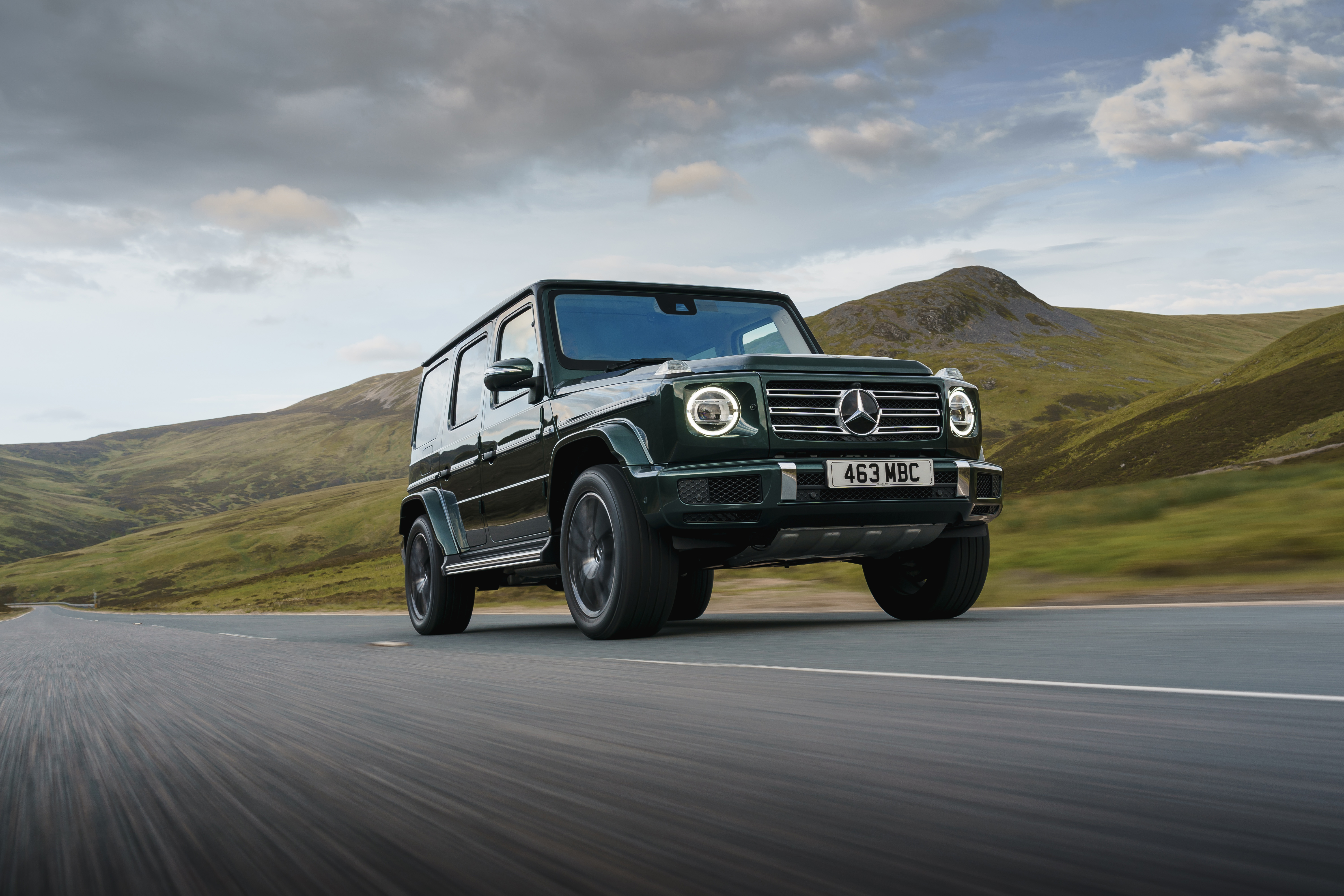 Mercedes-Benz G 400 d AMG Line SUV on a mountain road HD Wallpaper