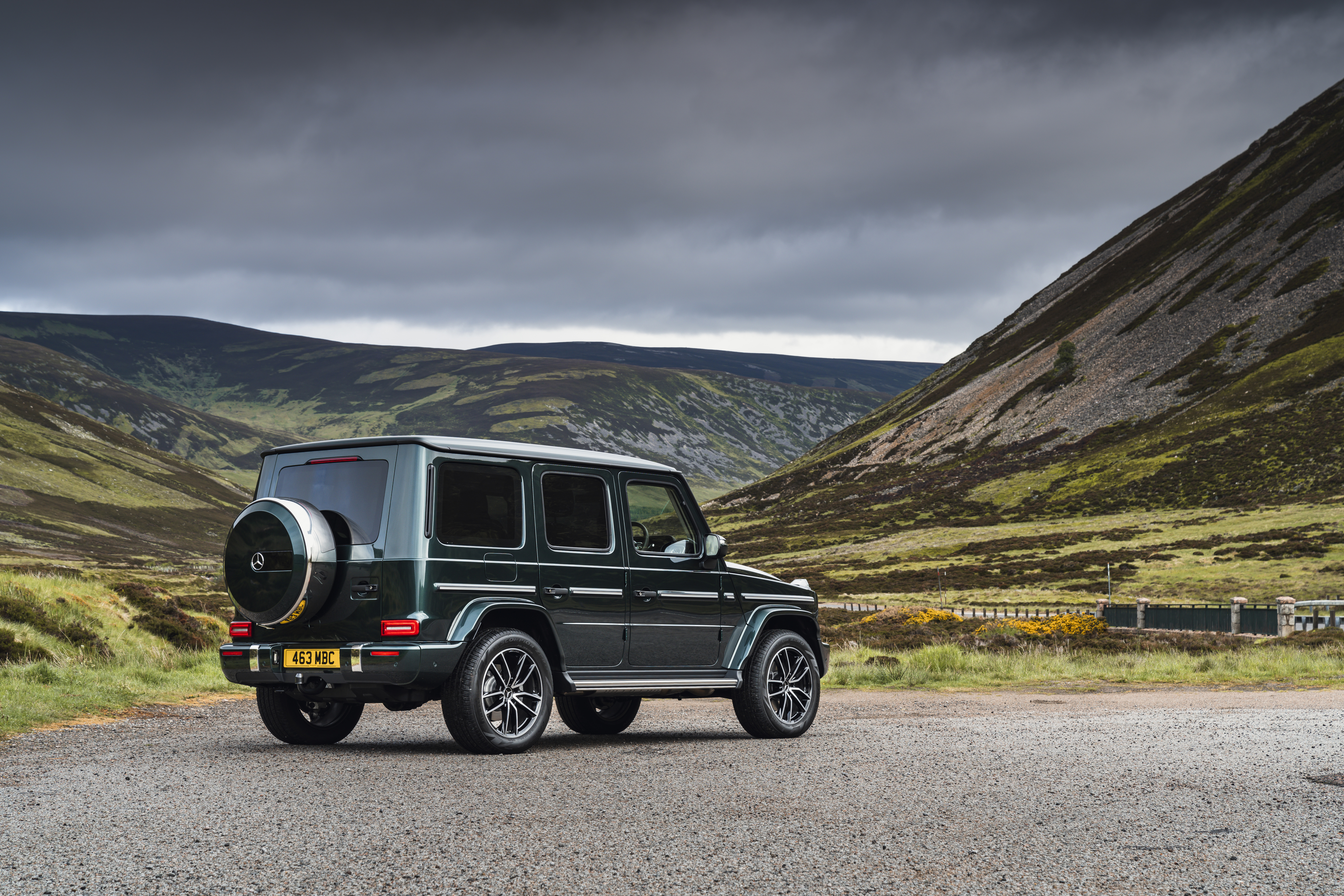 Mercedes-Benz G 400 d SUV on a cloudy mountain road HD Wallpaper