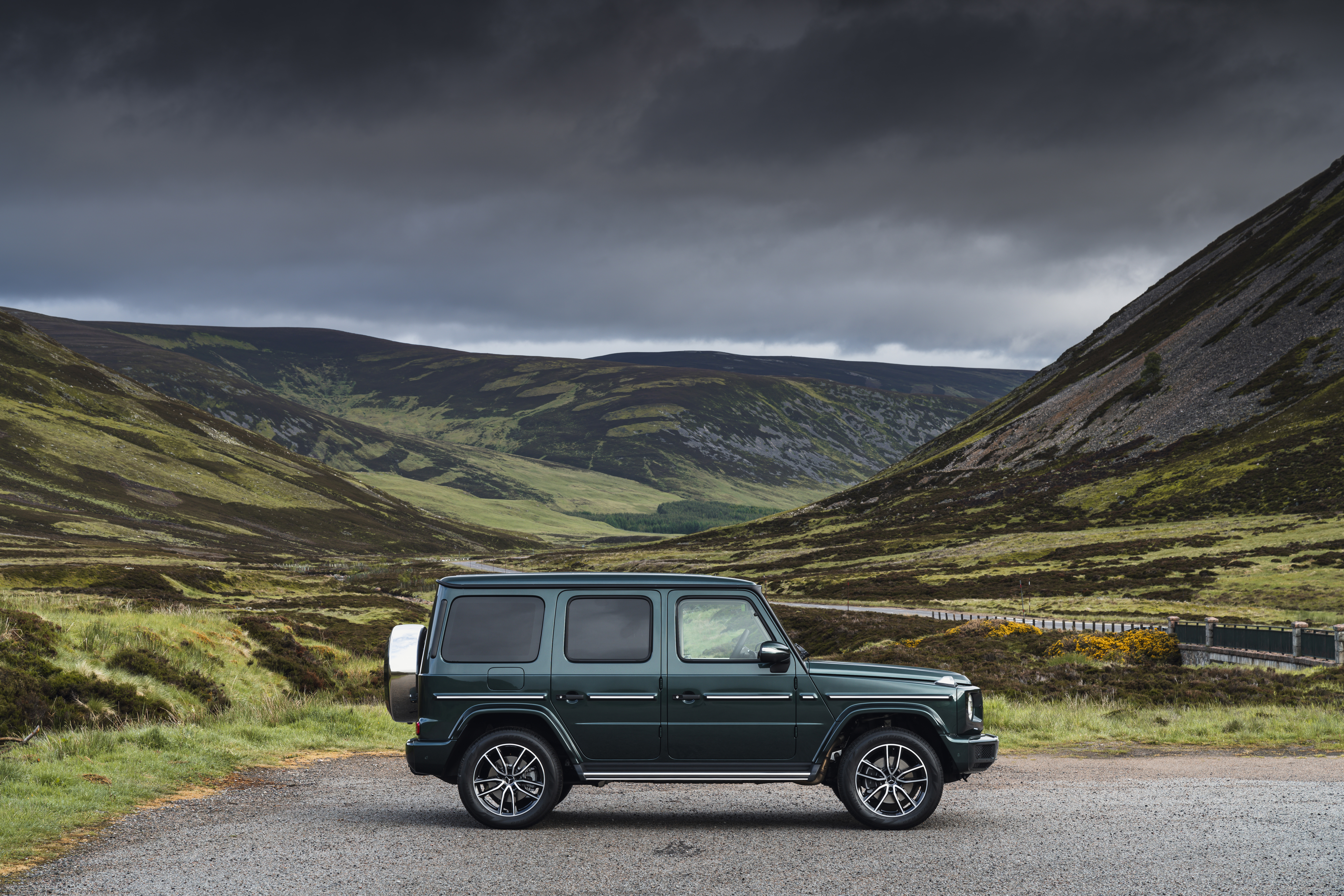 Mercedes-Benz G 400 d SUV in cloudy mountain valley HD Wallpaper
