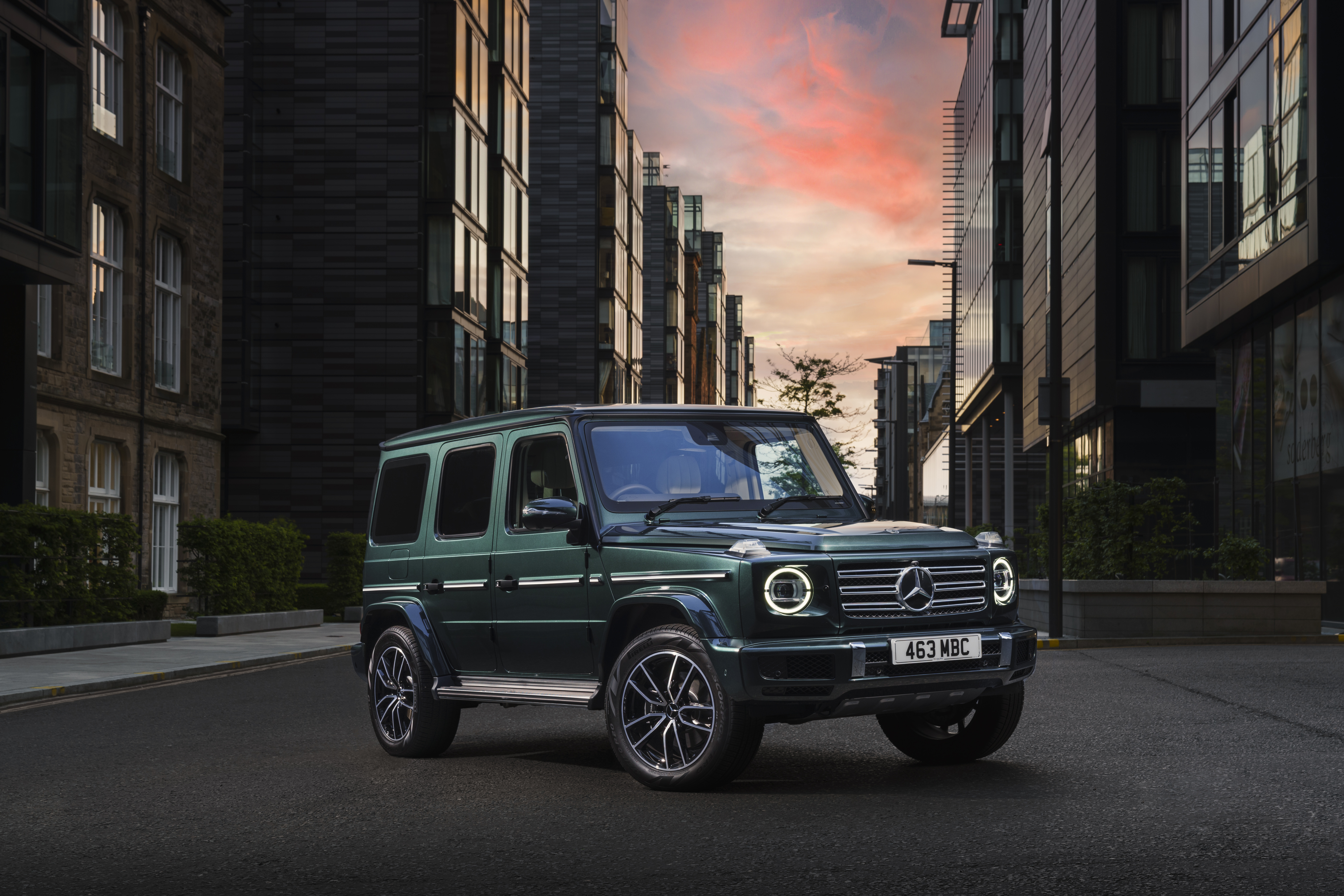 Dark green Mercedes-Benz G 400 d SUV at sunset. HD Wallpaper
