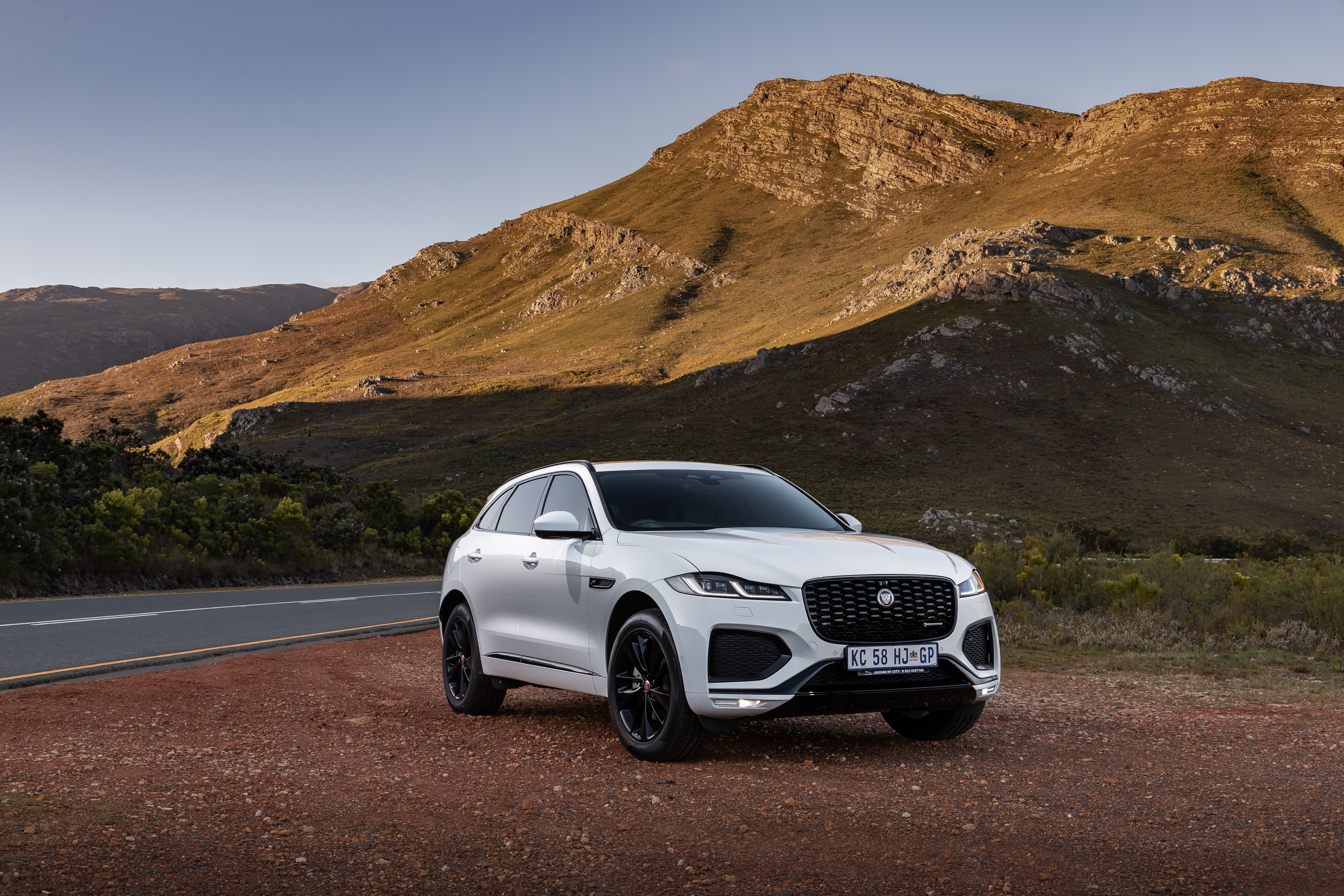 Jaguar F-Pace D300 R-Dynamic Black Pack SUV in mountains HD Wallpaper