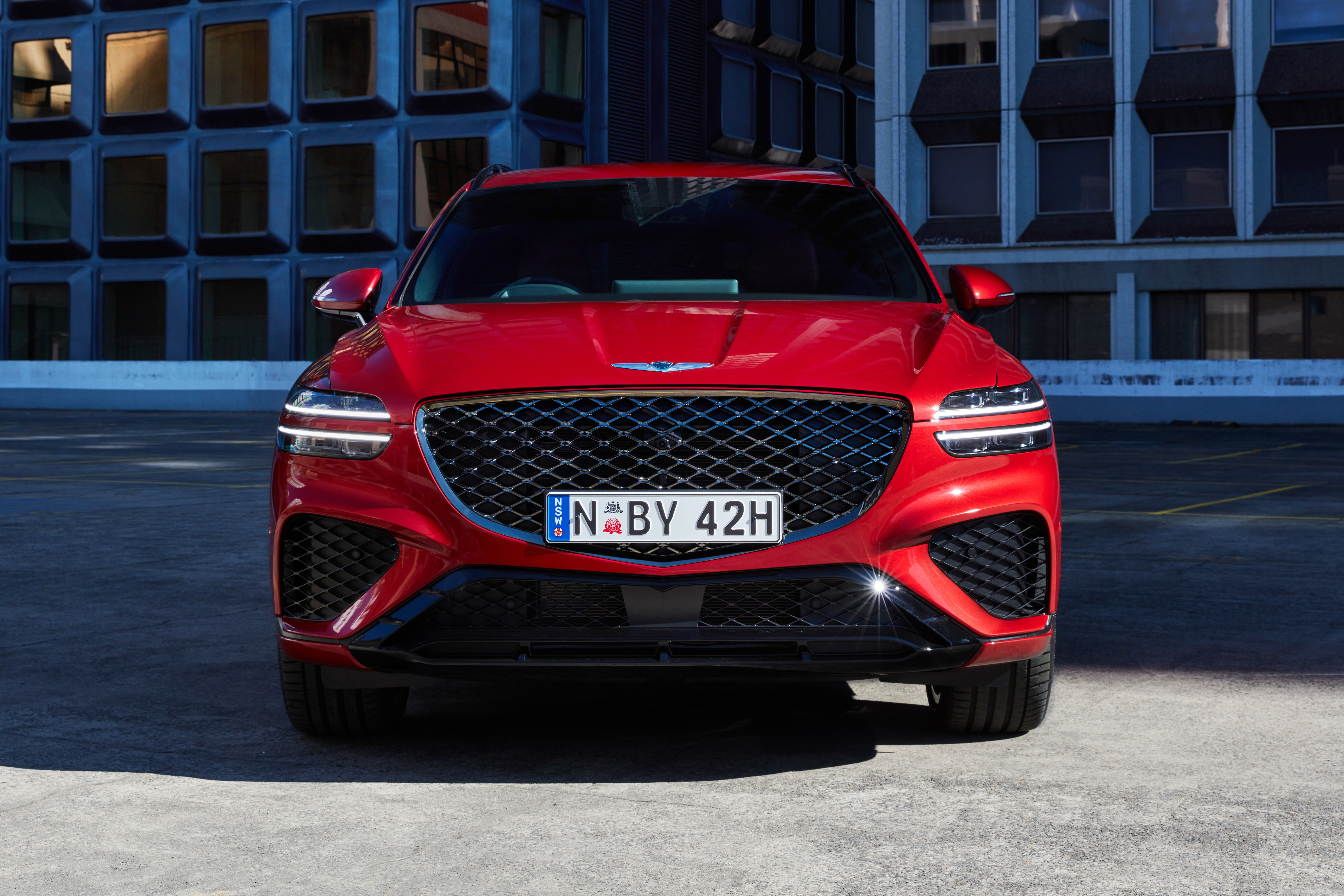 Red Genesis GV70 2.5T AWD SUV front view HD Wallpaper