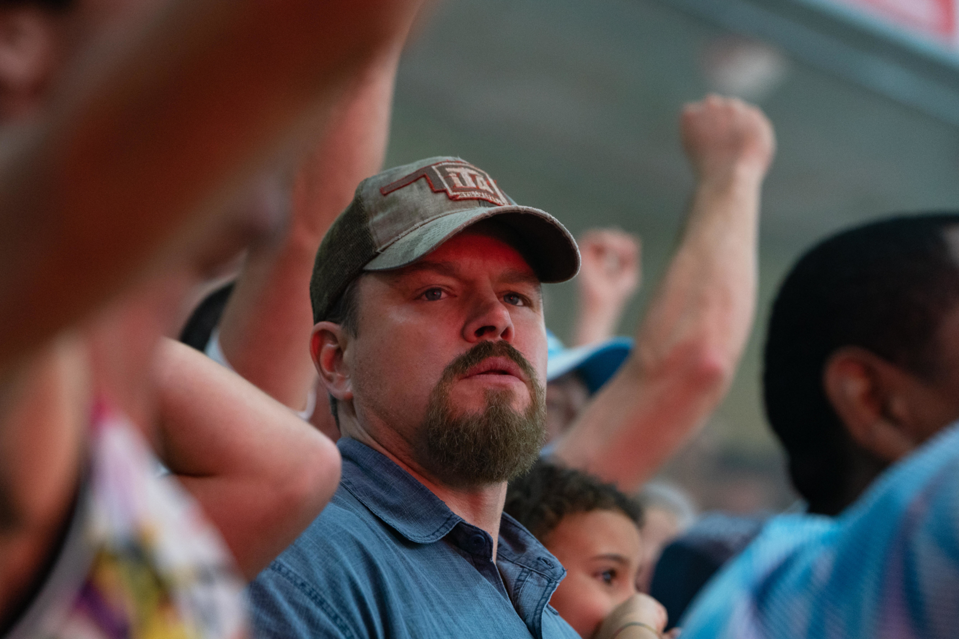 Matt Damon in Stillwater, observing the crowd HD Wallpaper